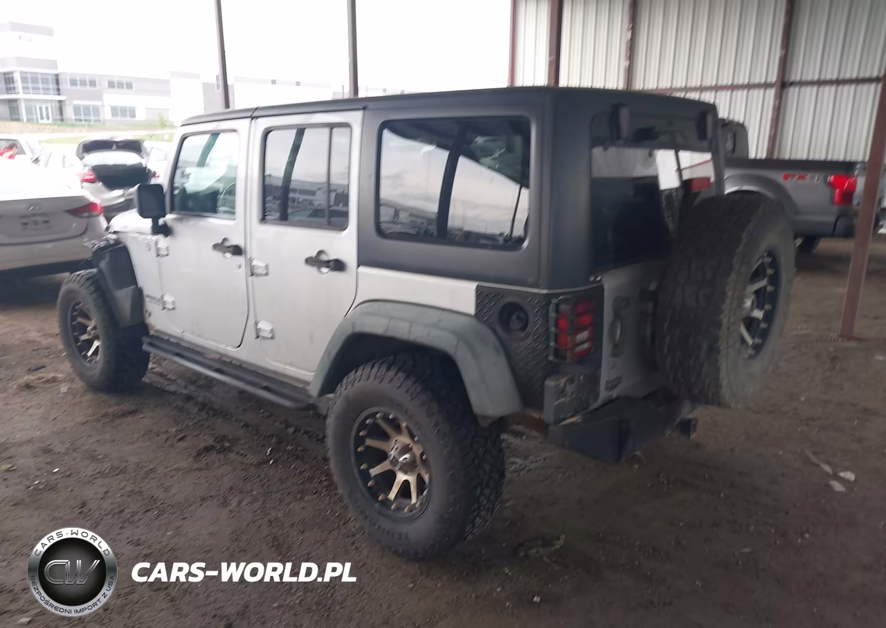 2011 Jeep Wrangler Unlimited Rubicon VIN:1J4HA6H18BL616024 - 3