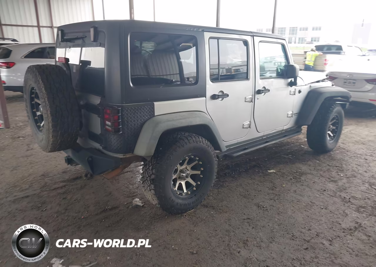 2011 Jeep Wrangler Unlimited Rubicon VIN:1J4HA6H18BL616024 - 4