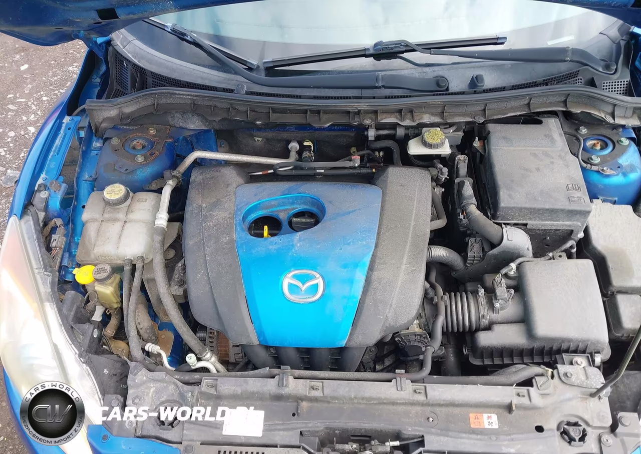 2012 Mazda Mazda3 I Touring VIN:JM1BL1V77C1634867 - 10