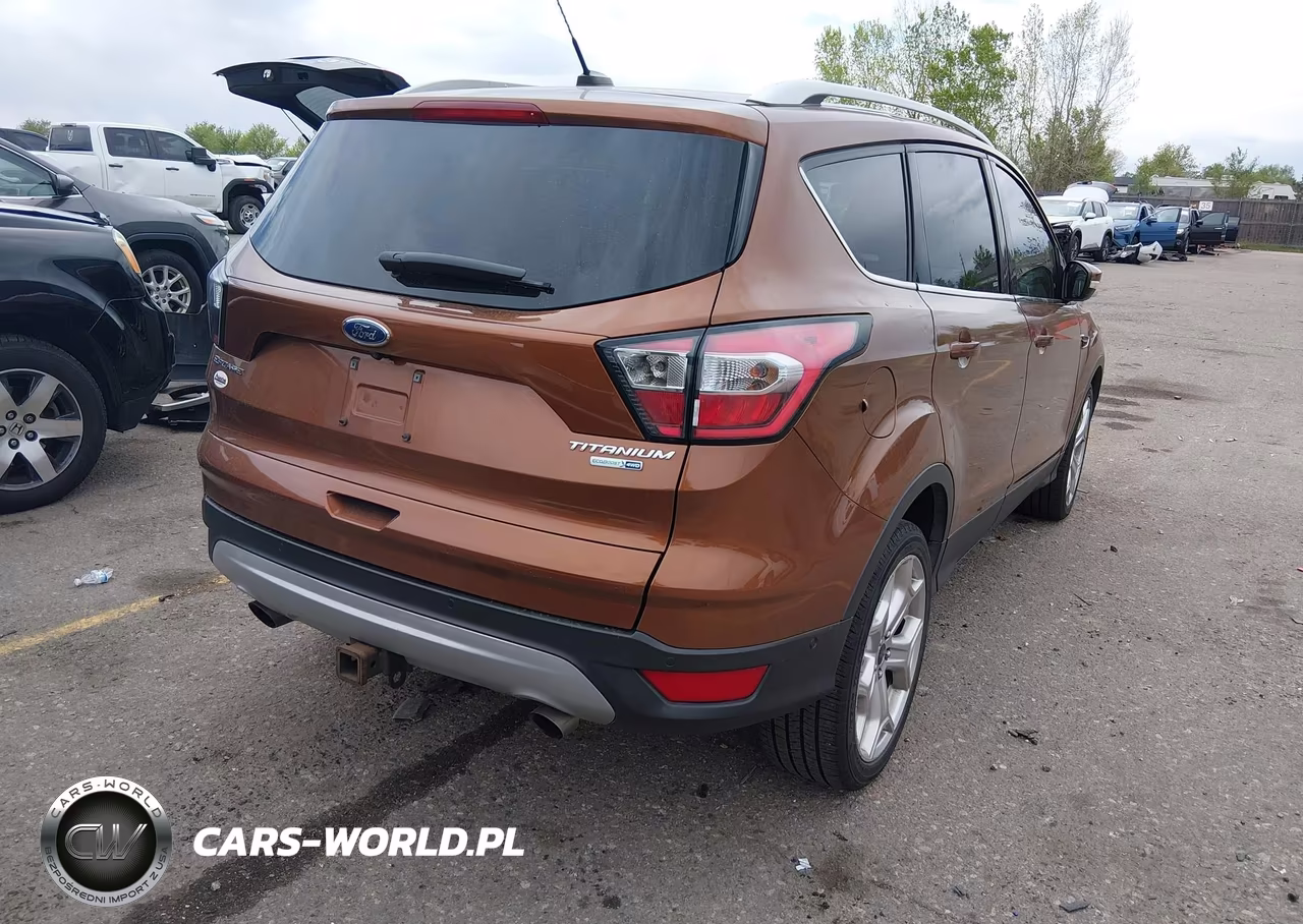 2017 Ford Escape Titanium VIN:1FMCU9J9XHUD11244 - 4