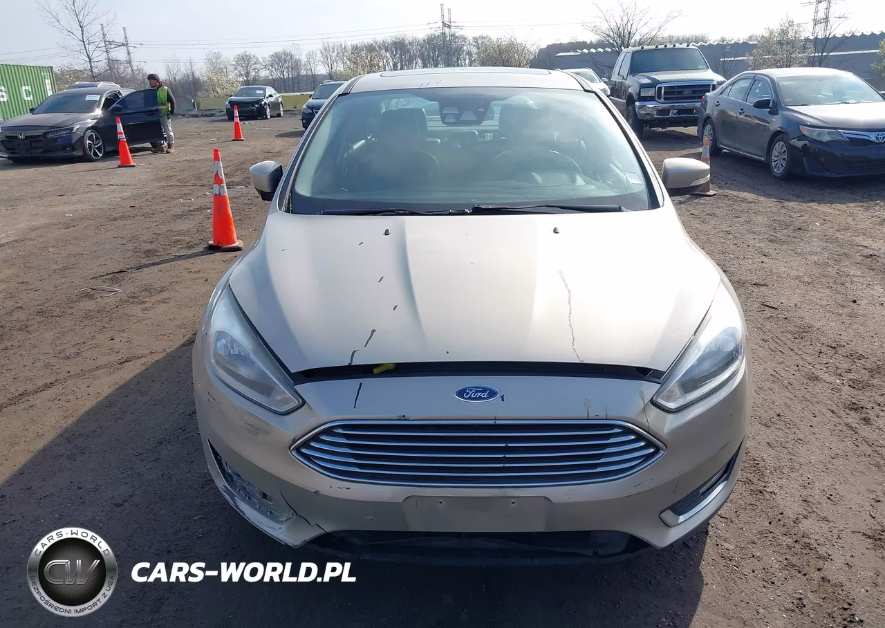 2017 Ford Focus Titanium VIN:1FADP3J24HL335602 - 12