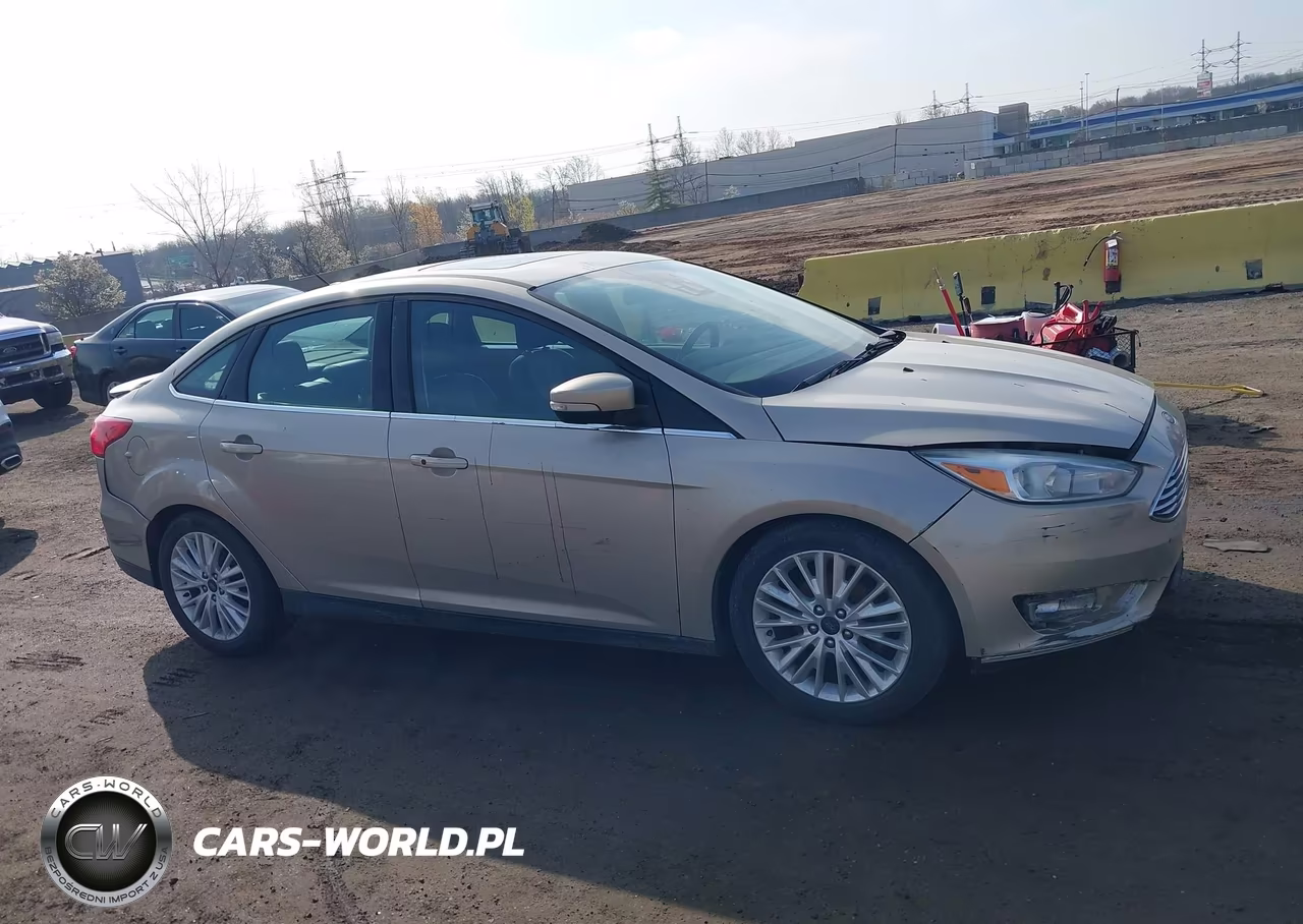 2017 Ford Focus Titanium VIN:1FADP3J24HL335602 - 13