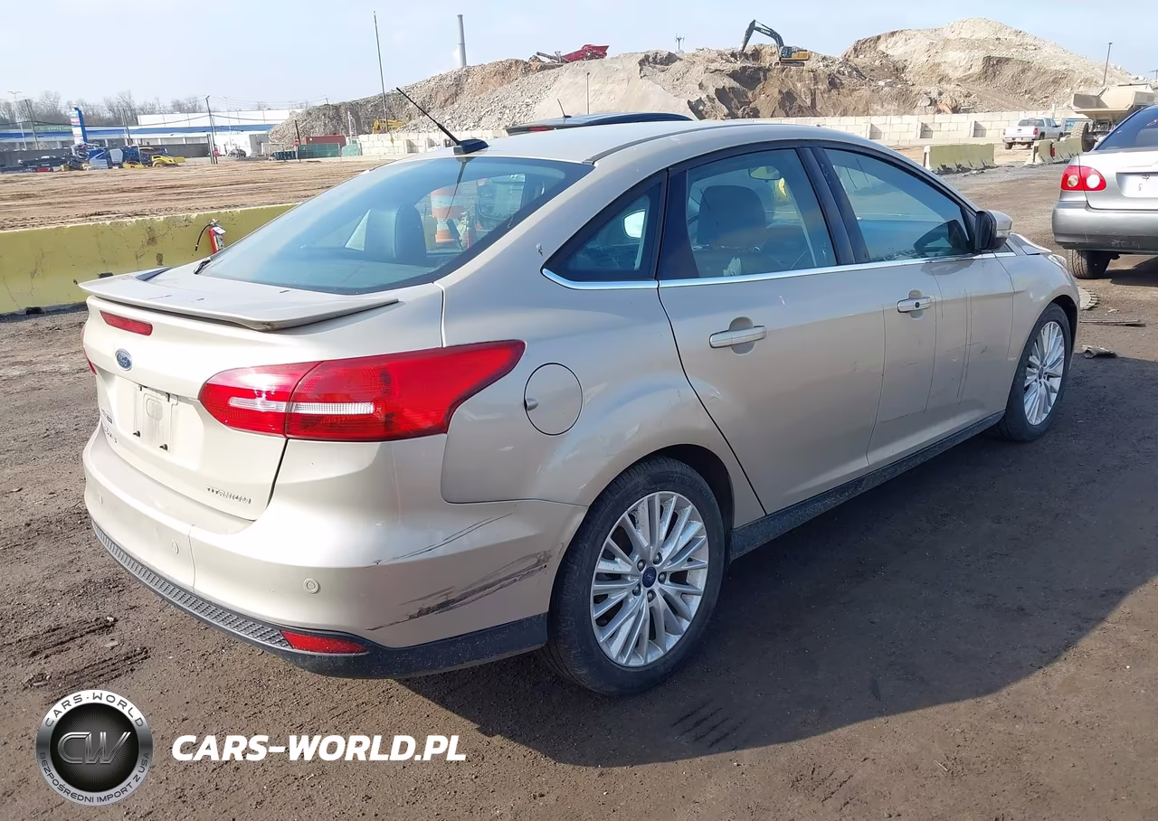 2017 Ford Focus Titanium VIN:1FADP3J24HL335602 - 4
