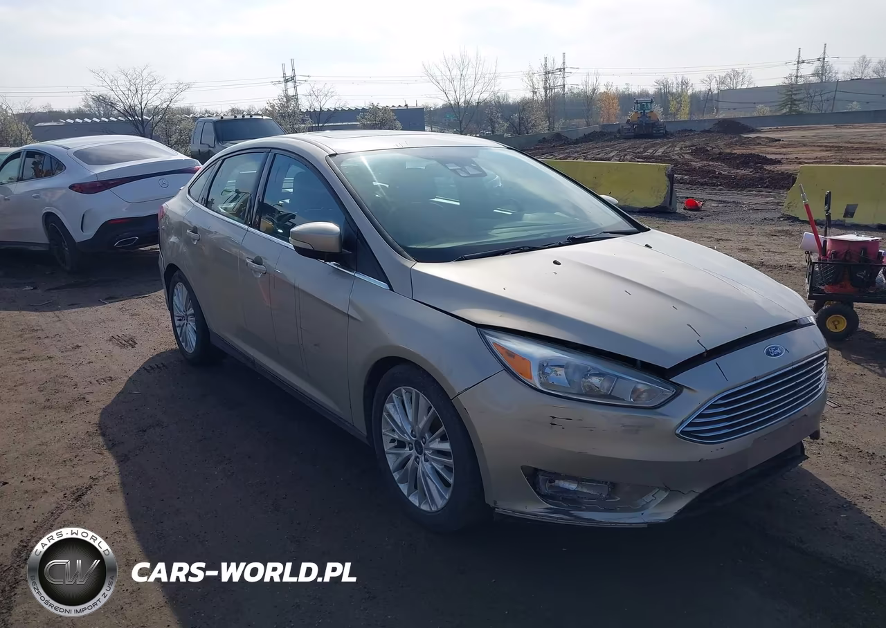2017 Ford Focus Titanium VIN:1FADP3J24HL335602 - 6