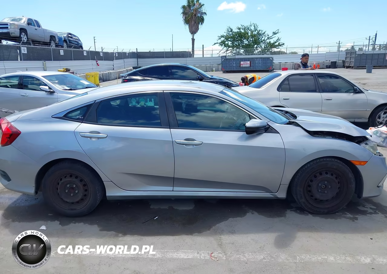 2019 Honda Civic Lx VIN:19XFC2F66KE210945 - 13