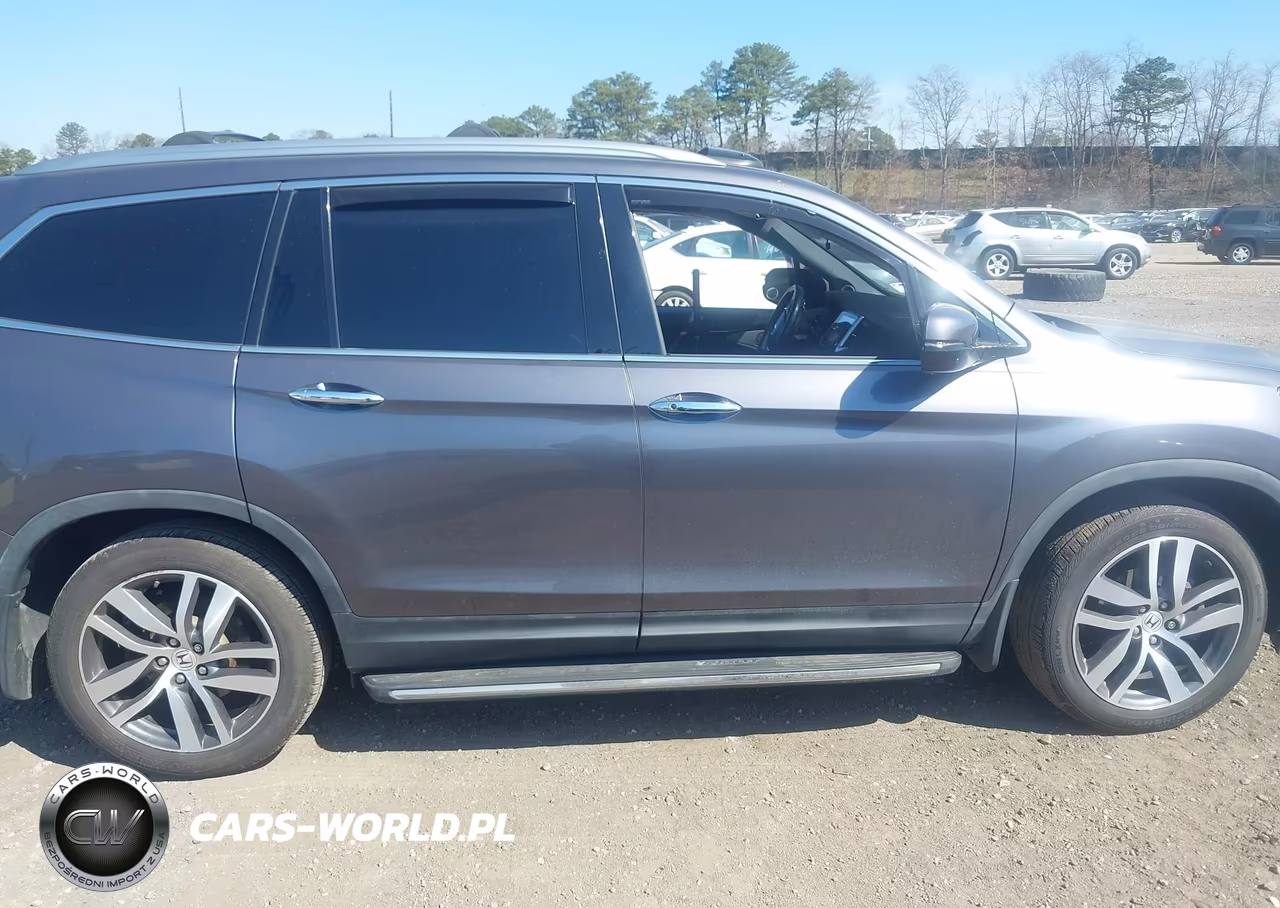 2017 Honda Pilot Elite VIN:5FNYF6H07HB070861 - 13