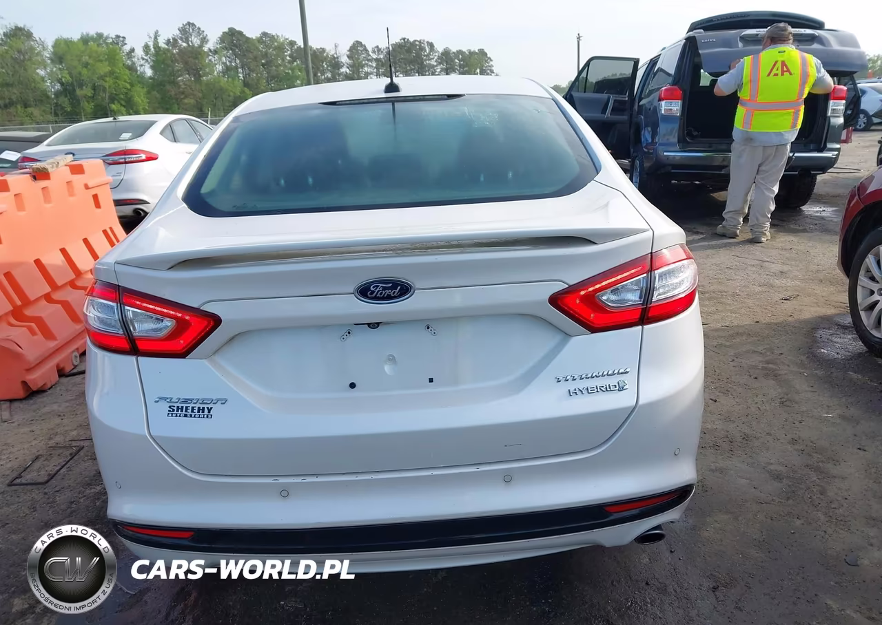 2014 Ford Fusion Hybrid Titanium VIN:3FA6P0RU6ER385539 - 16
