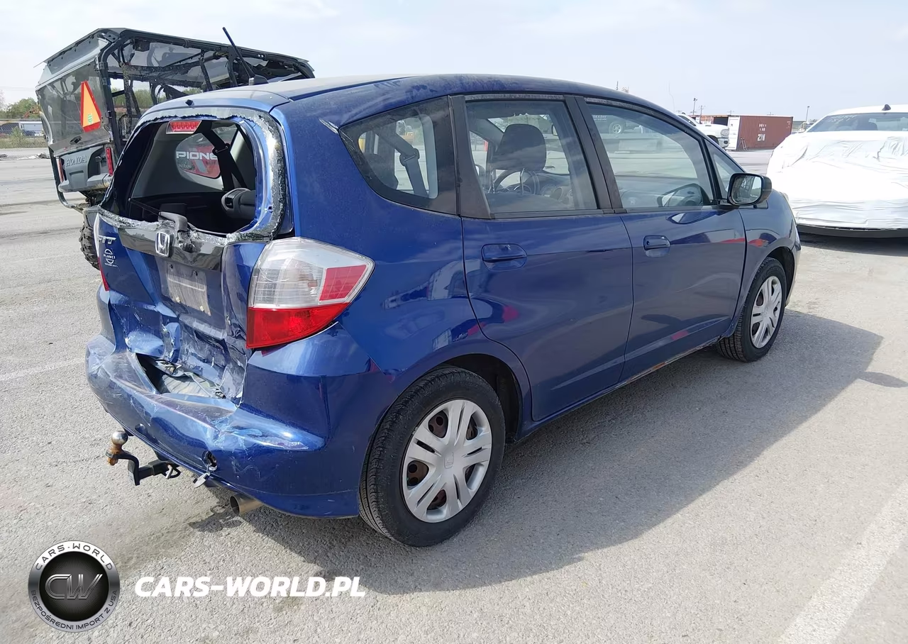 2010 Honda Fit VIN:JHMGE8H28AC000119 - 4