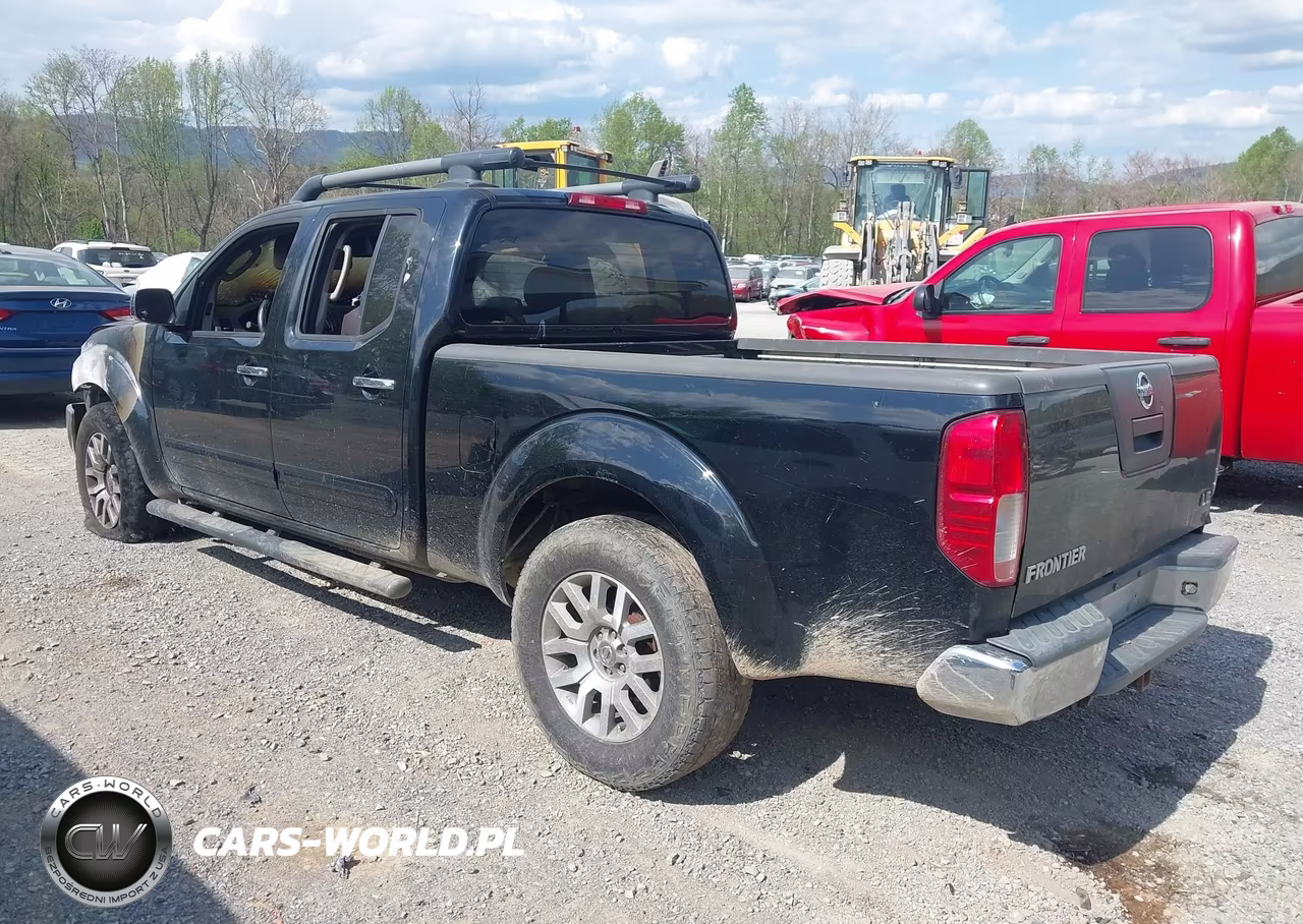 2009 Nissan Frontier Le VIN:1N6AD09U79C402976 - 3