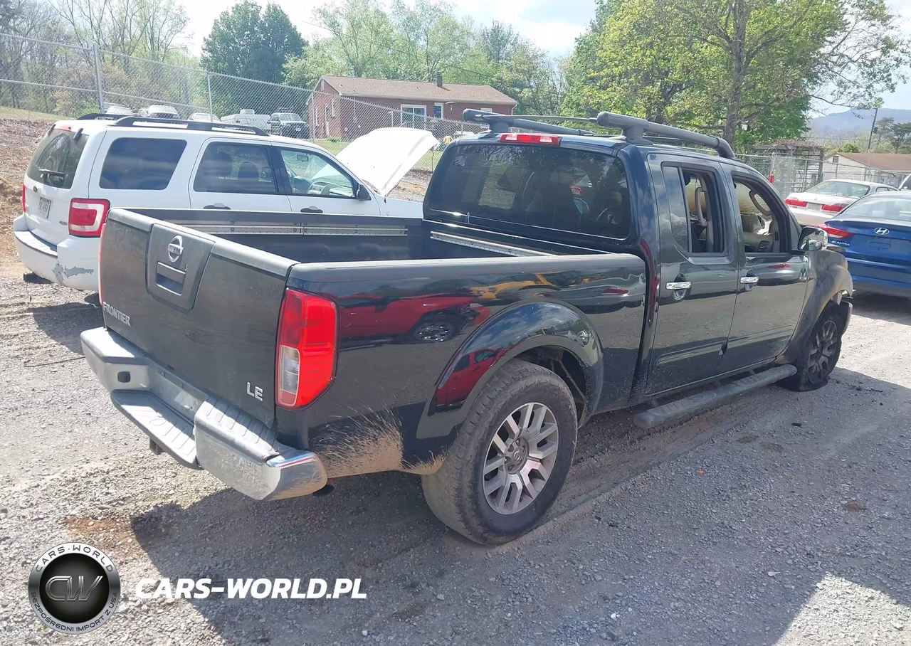 2009 Nissan Frontier Le VIN:1N6AD09U79C402976 - 4