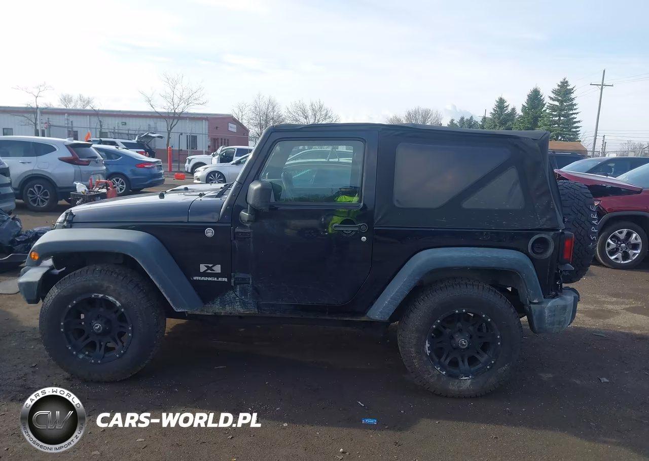 2009 Jeep Wrangler X VIN:1J4FA24119L747201 - 15