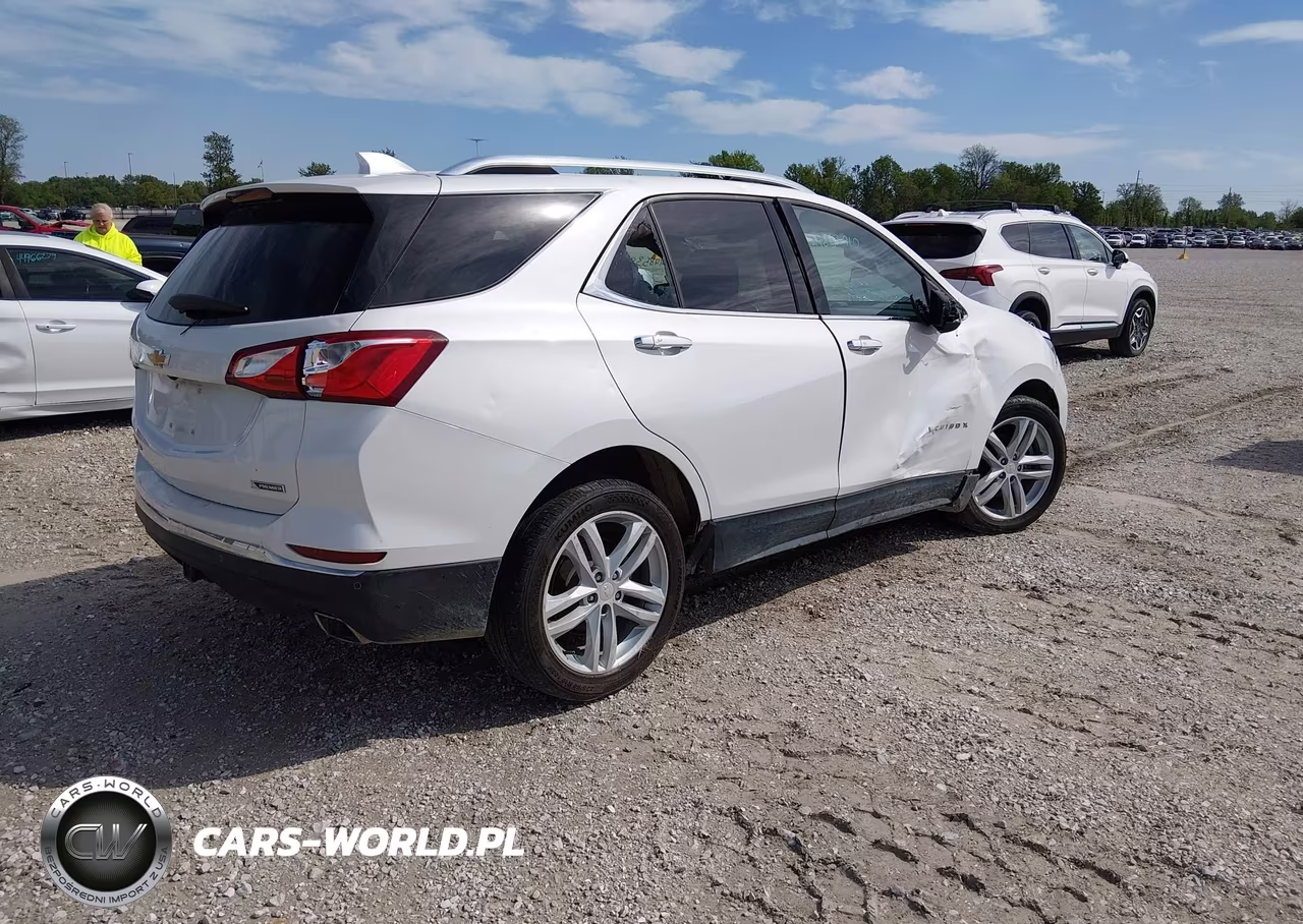 2018 Chevrolet Equinox Premier VIN:2GNAXNEX1J6106489 - 4