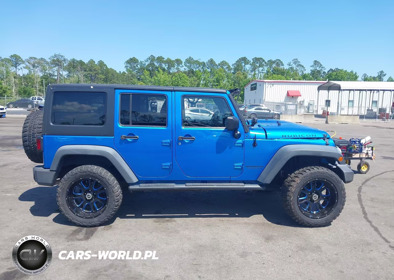 2015 Jeep Wrangler Unlimited Rubicon VIN:1C4BJWFG3FL580624 - 13