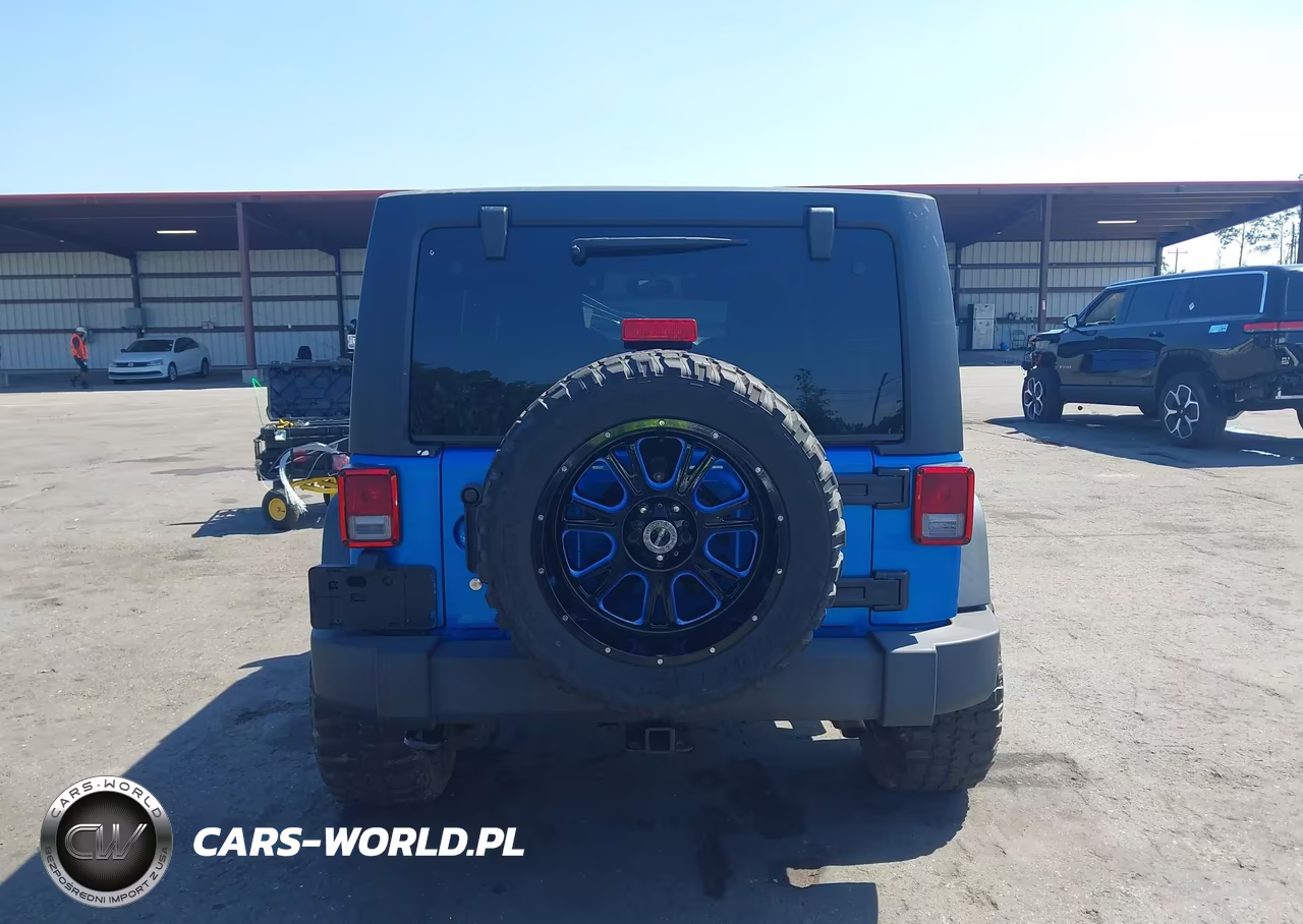 2015 Jeep Wrangler Unlimited Rubicon VIN:1C4BJWFG3FL580624 - 16