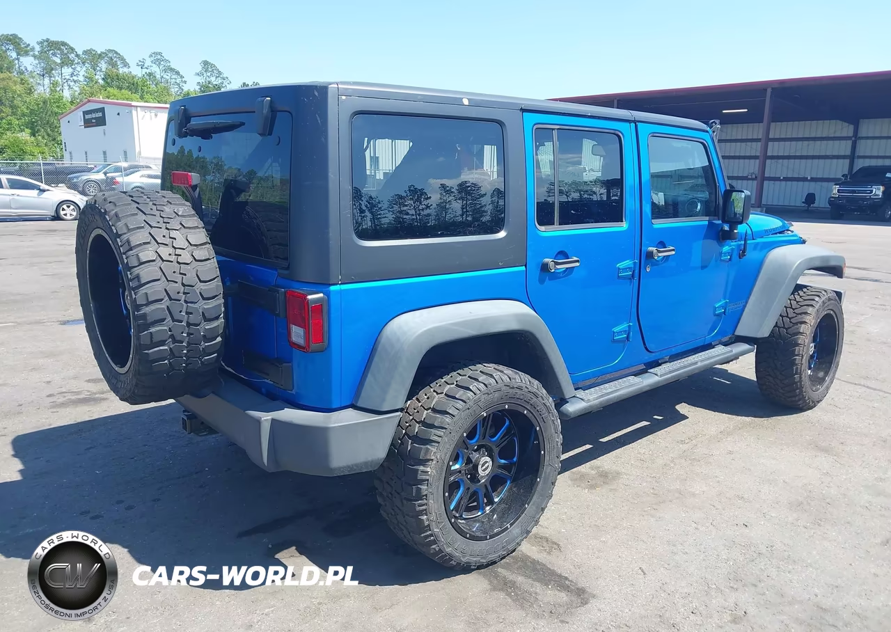 2015 Jeep Wrangler Unlimited Rubicon VIN:1C4BJWFG3FL580624 - 4