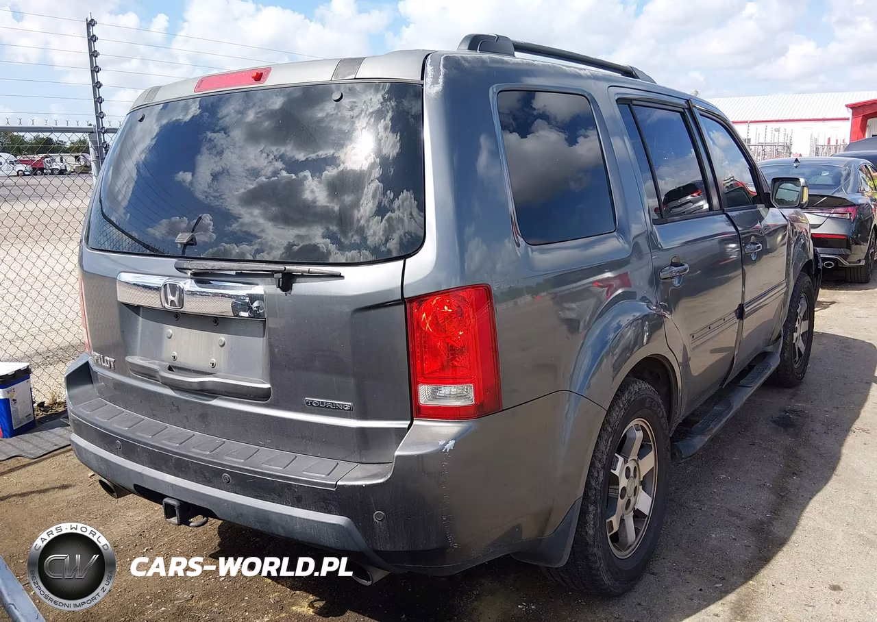 2010 Honda Pilot Touring VIN:5FNYF3H91AB010948 - 4