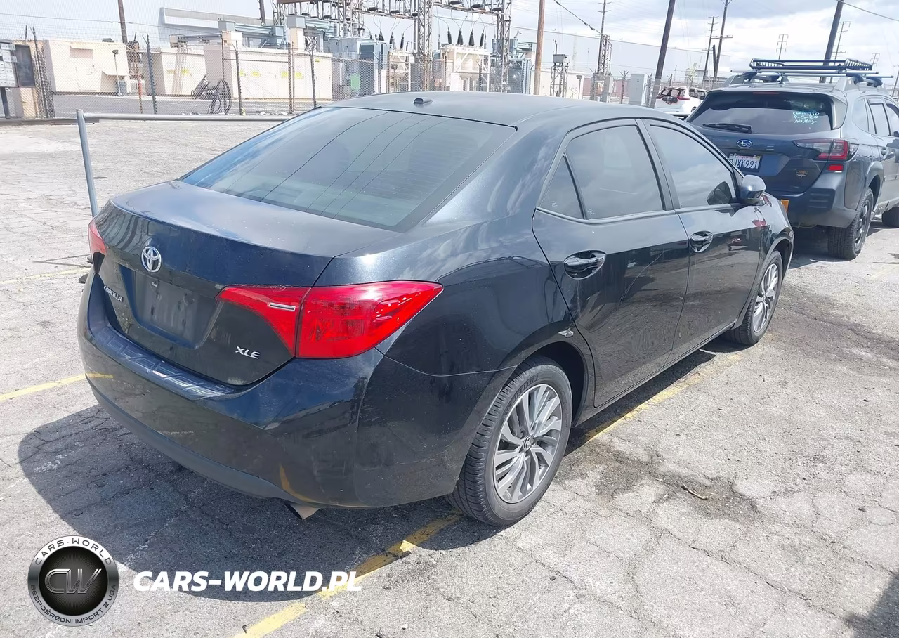 2018 Toyota Corolla Xle VIN:5YFBURHE4JP824043 - 4