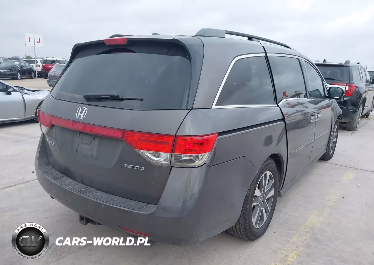 2016 Honda Odyssey Touring-Touring Elite VIN:5FNRL5H90GB131424 - 4