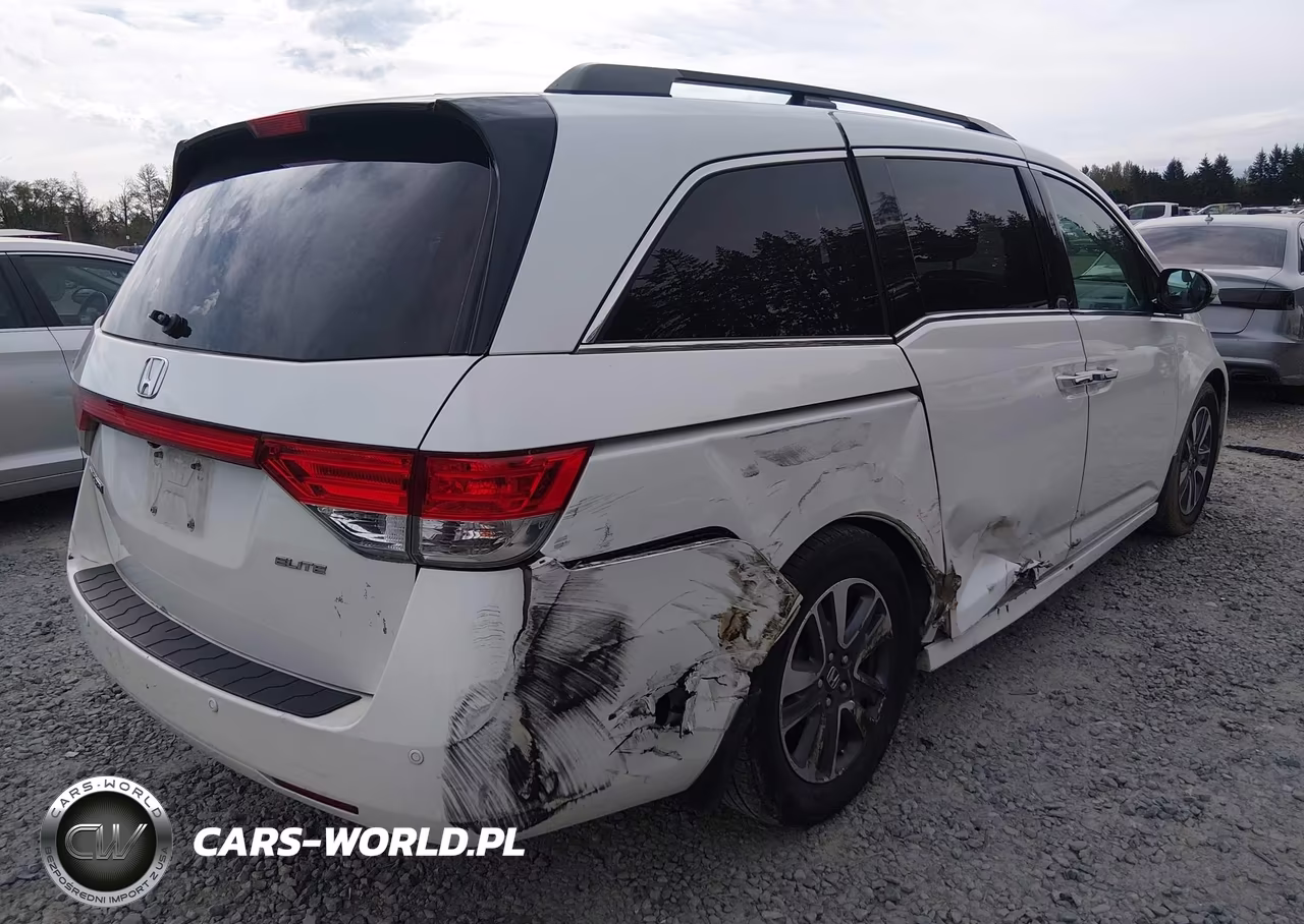 2014 Honda Odyssey Touring-Touring Elite VIN:5FNRL5H99EB102372 - 4