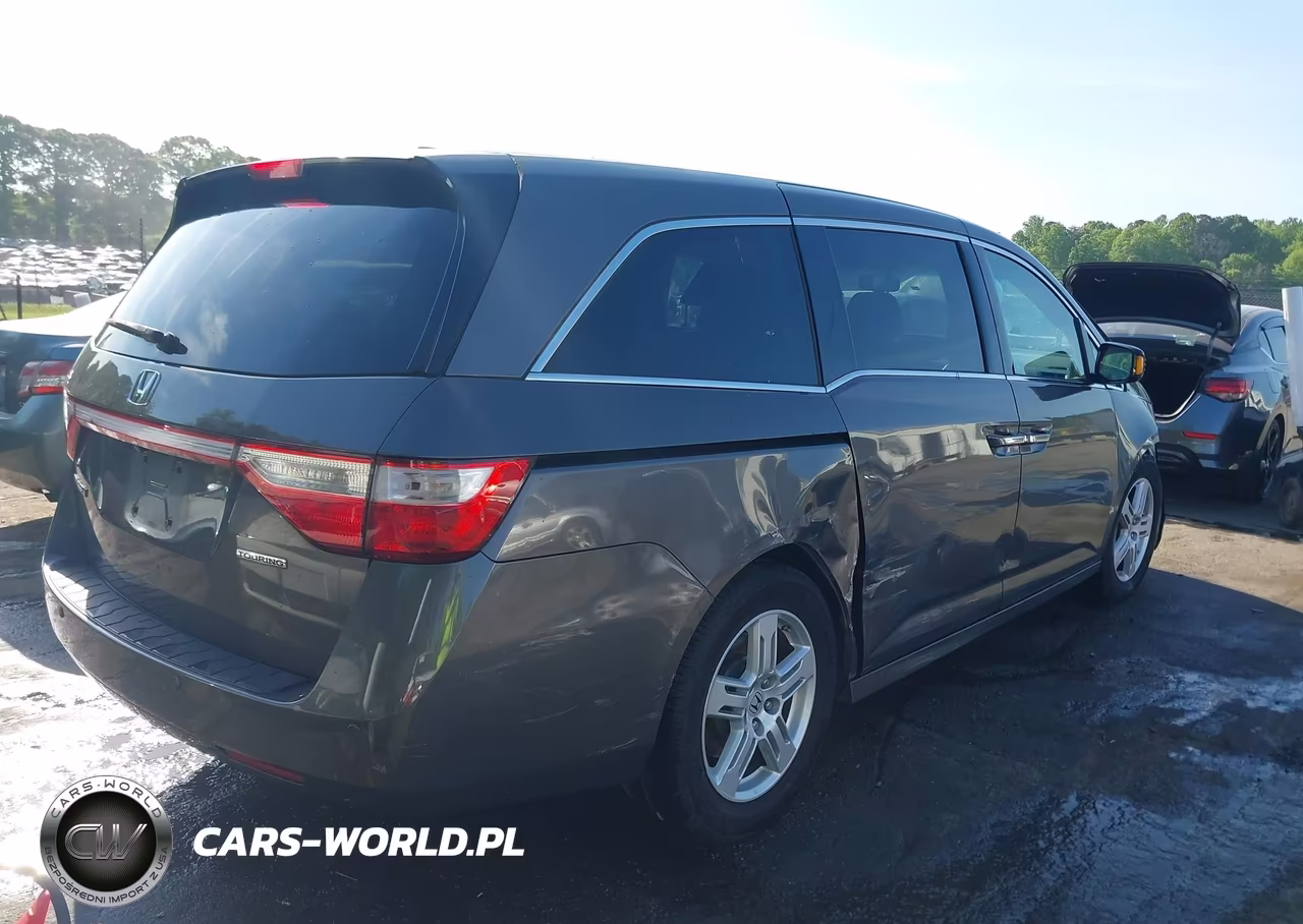 2011 Honda Odyssey Touring-Touring Elite VIN:5FNRL5H90BB072674 - 4