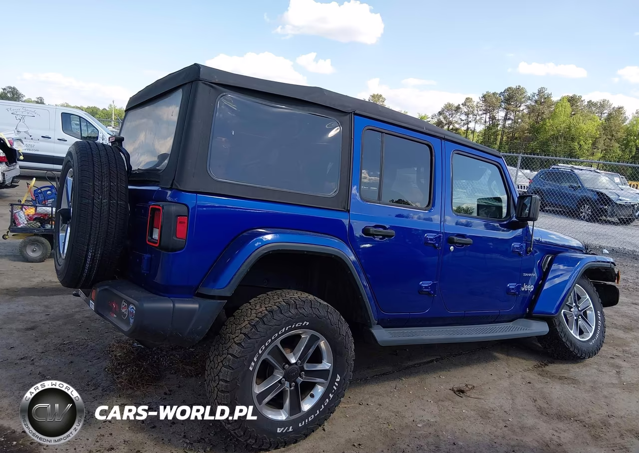 2019 Jeep Wrangler Unlimited Sahara 4X4 VIN:1C4HJXEN5KW520353 - 14