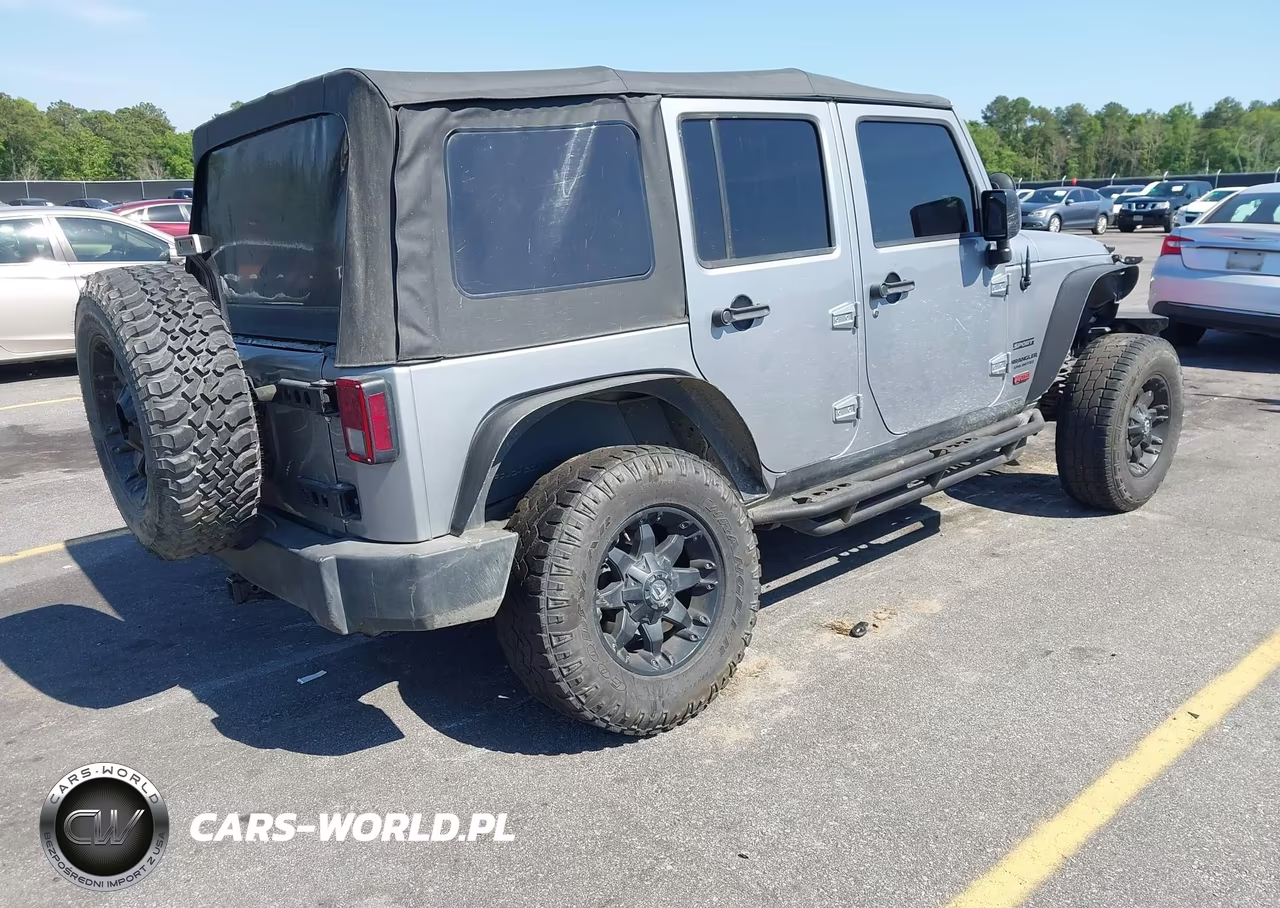 2014 Jeep Wrangler Unlimited Sport VIN:1C4HJWDG3EL148109 - 4