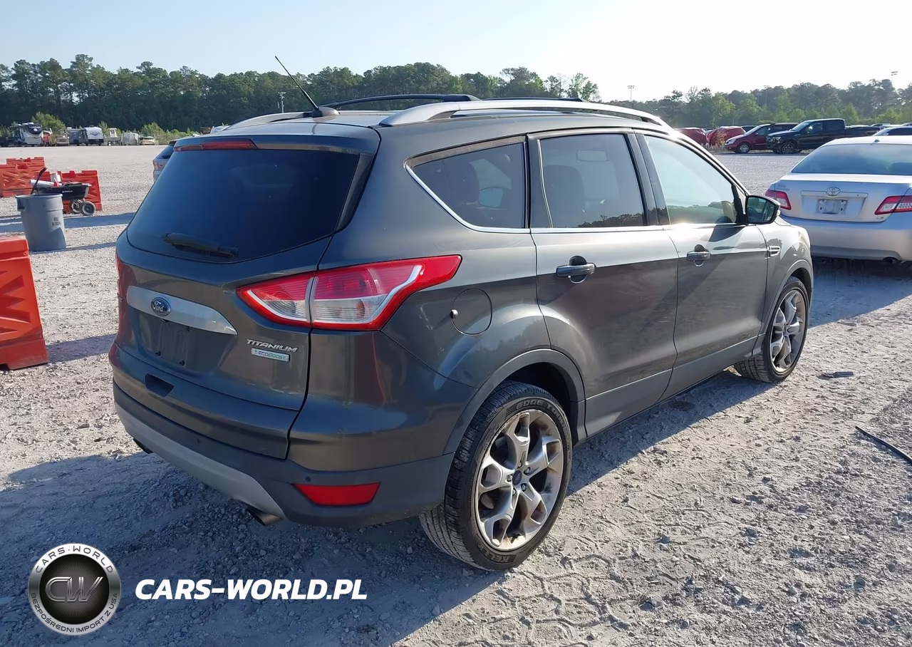 2015 Ford Escape Titanium VIN:1FMCU0J95FUB56014 - 4