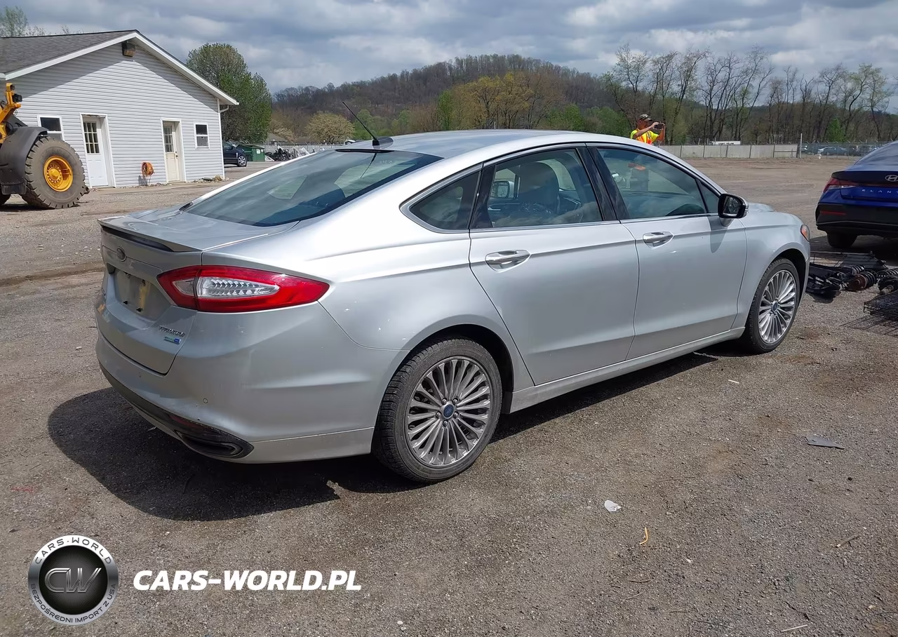 2015 Ford Fusion Titanium VIN:3FA6P0D90FR172610 - 4