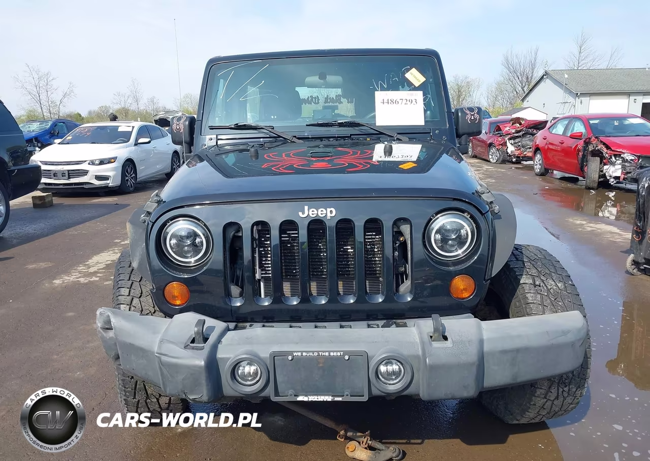 2012 Jeep Wrangler Unlimited Sport VIN:1C4BJWDG4CL209857 - 12