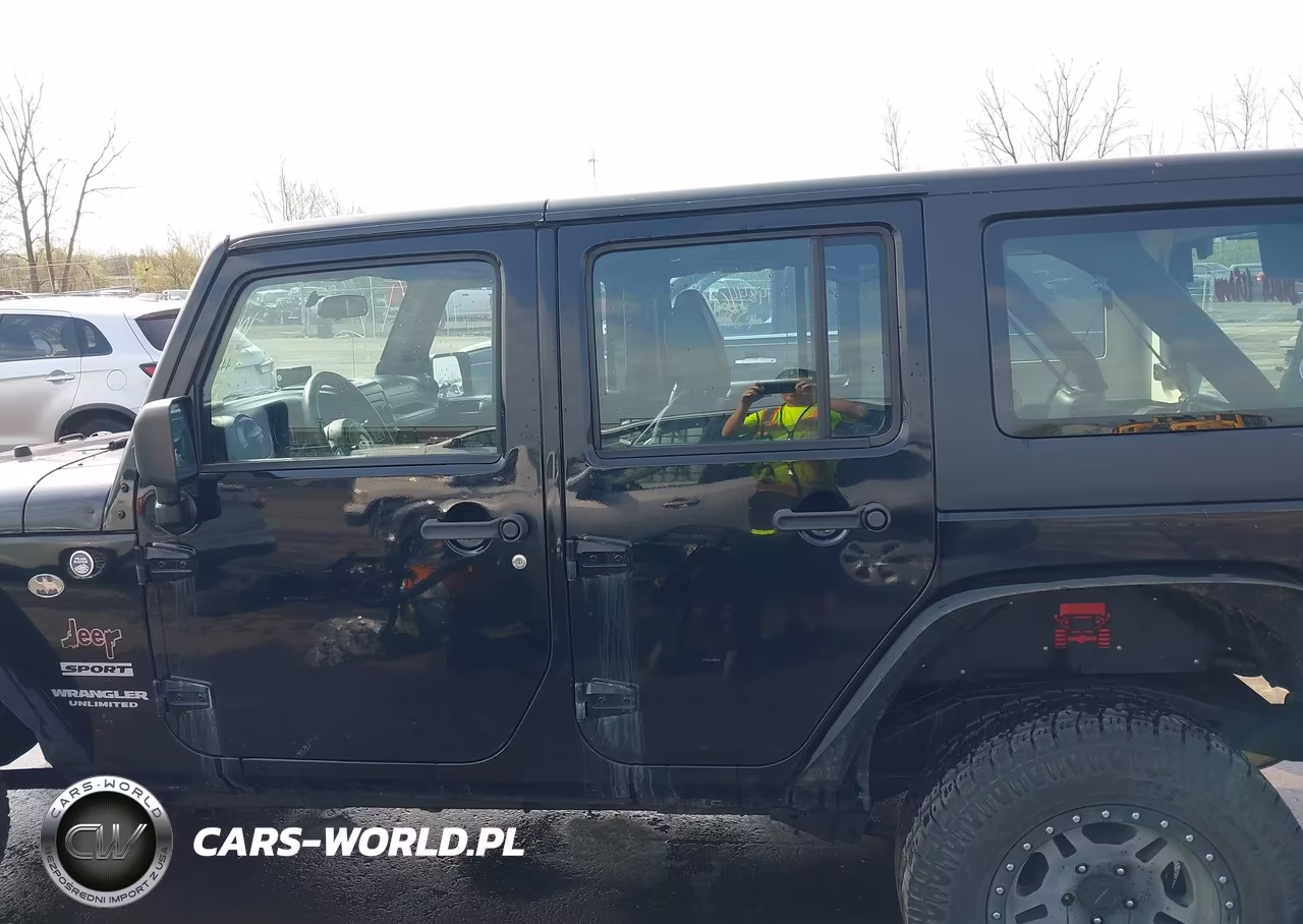 2012 Jeep Wrangler Unlimited Sport VIN:1C4BJWDG4CL209857 - 14