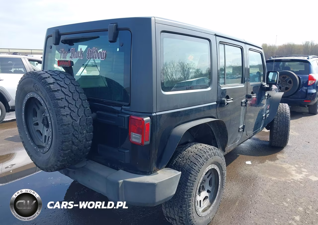 2012 Jeep Wrangler Unlimited Sport VIN:1C4BJWDG4CL209857 - 4