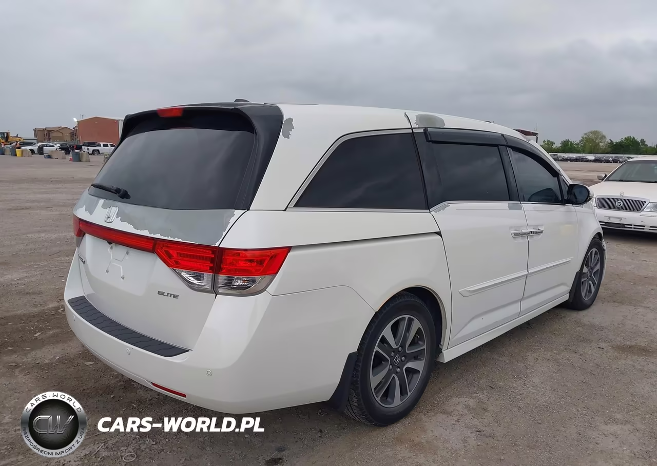 2014 Honda Odyssey Touring-Touring Elite VIN:5FNRL5H94EB093046 - 4