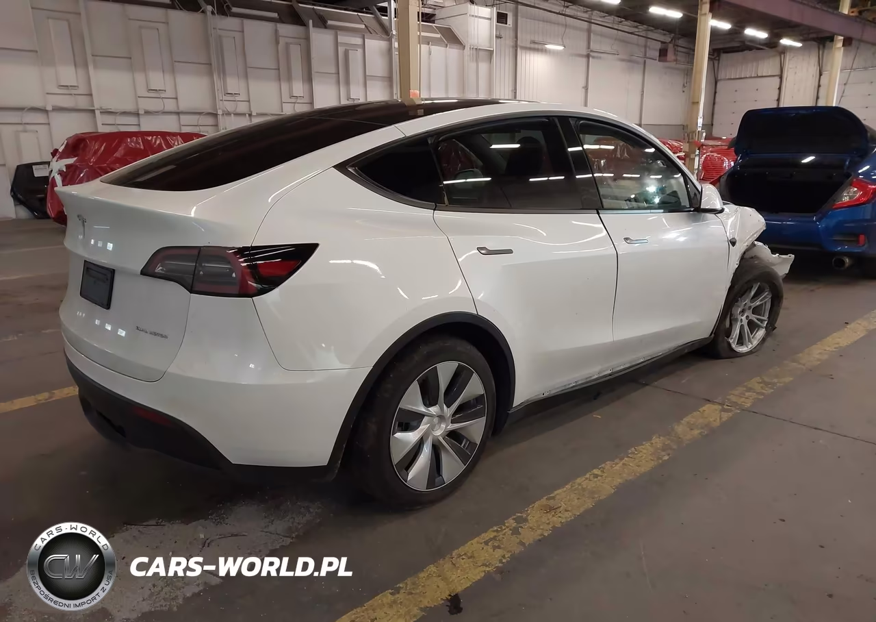 2023 Tesla Model Y VIN:7SAYGDEE5PF788671 - 4