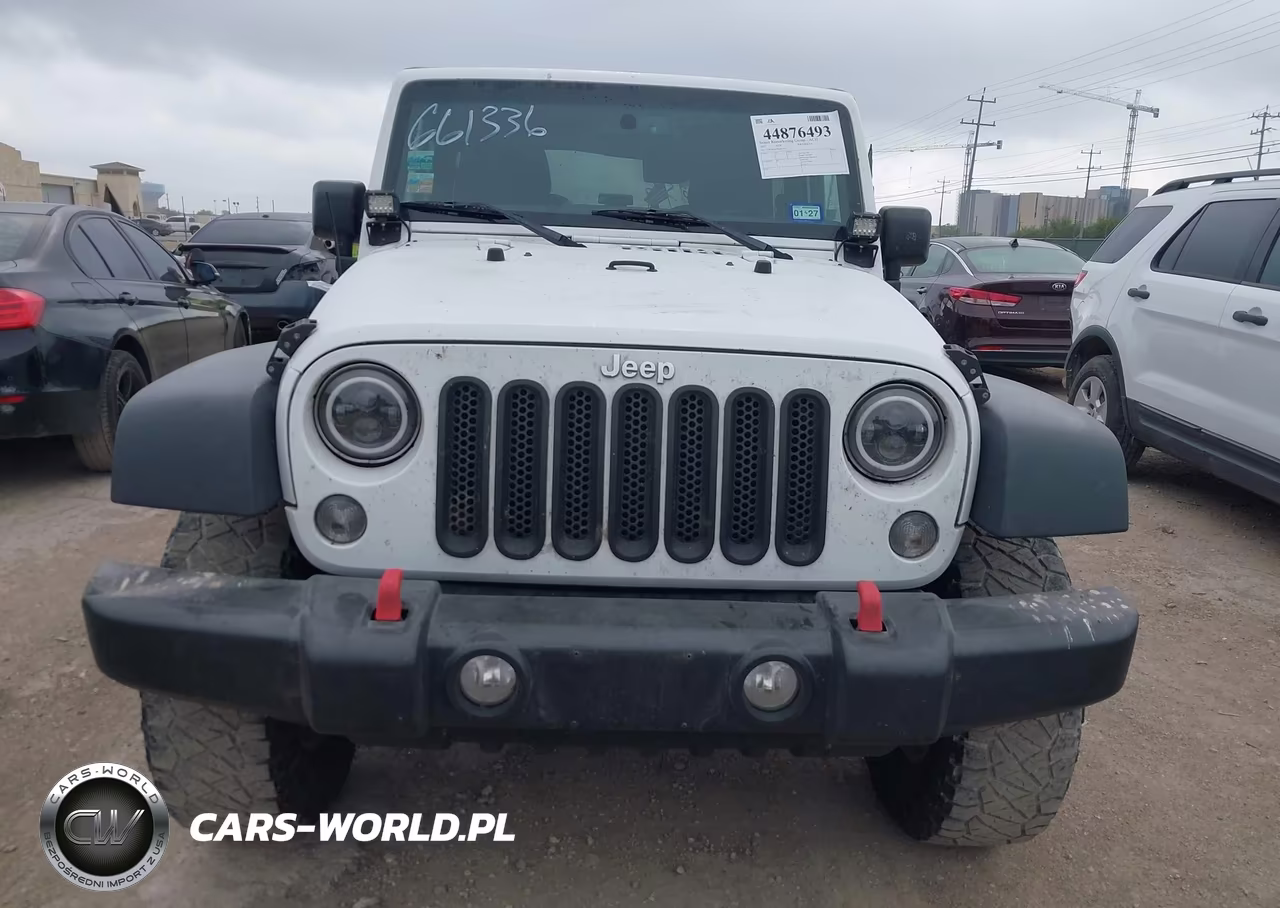 2015 Jeep Wrangler Sport VIN:1C4GJWAG2FL661336 - 12