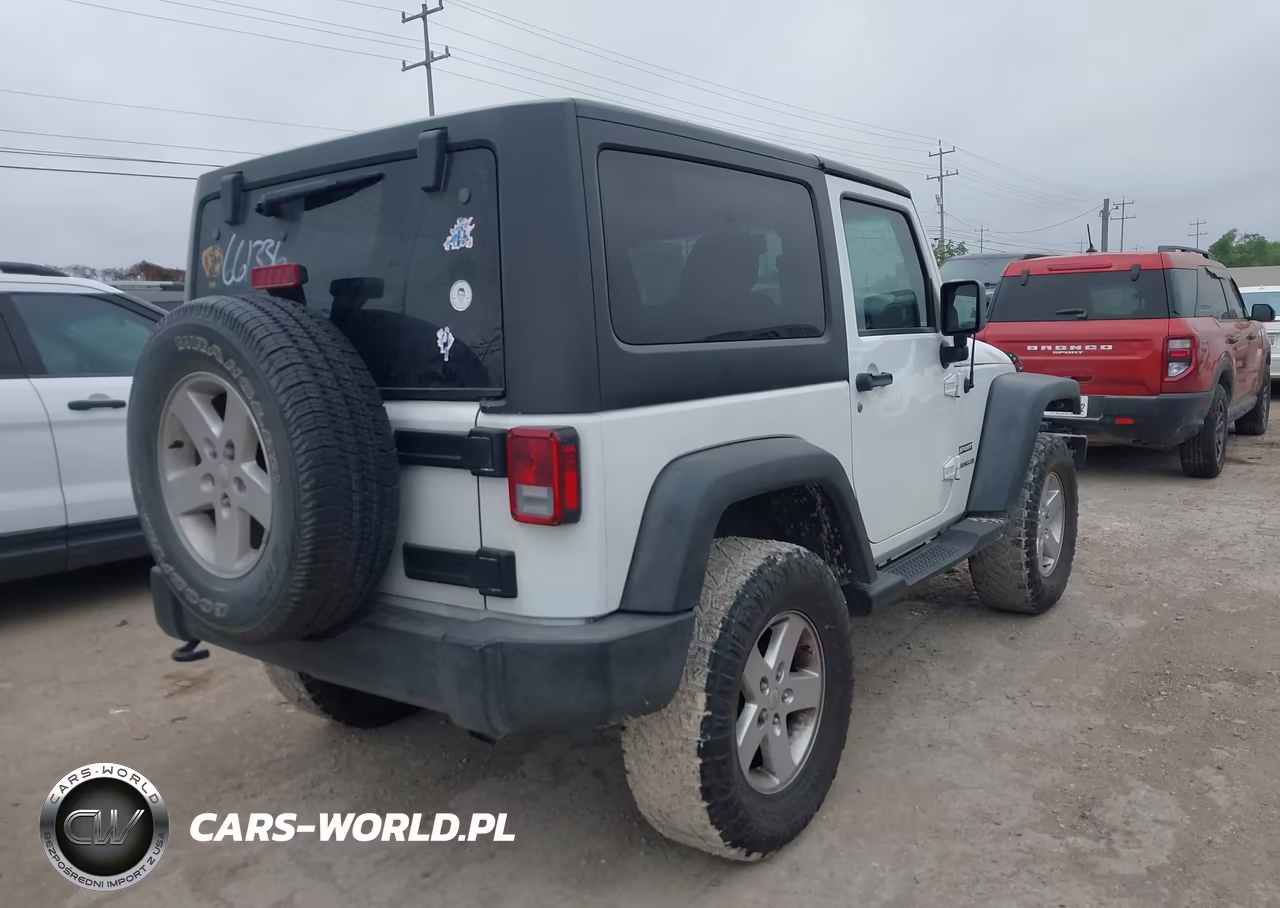 2015 Jeep Wrangler Sport VIN:1C4GJWAG2FL661336 - 4