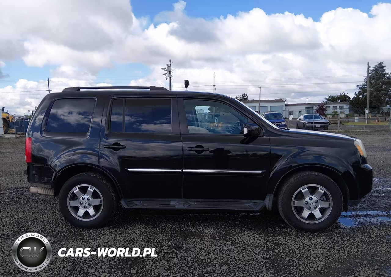 2011 Honda Pilot Touring VIN:5FNYF4H90BB061185 - 14