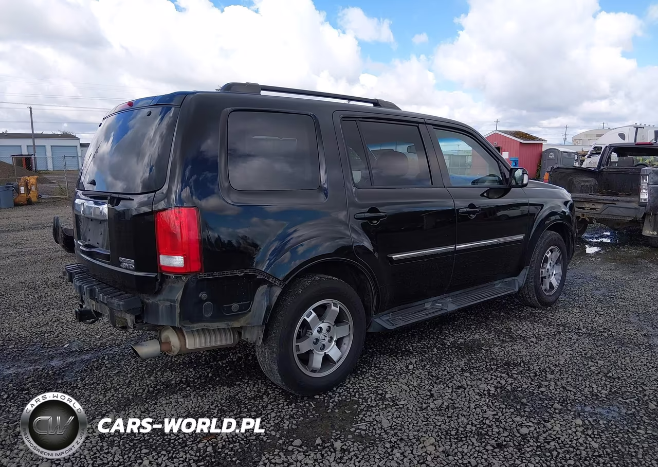 2011 Honda Pilot Touring VIN:5FNYF4H90BB061185 - 4