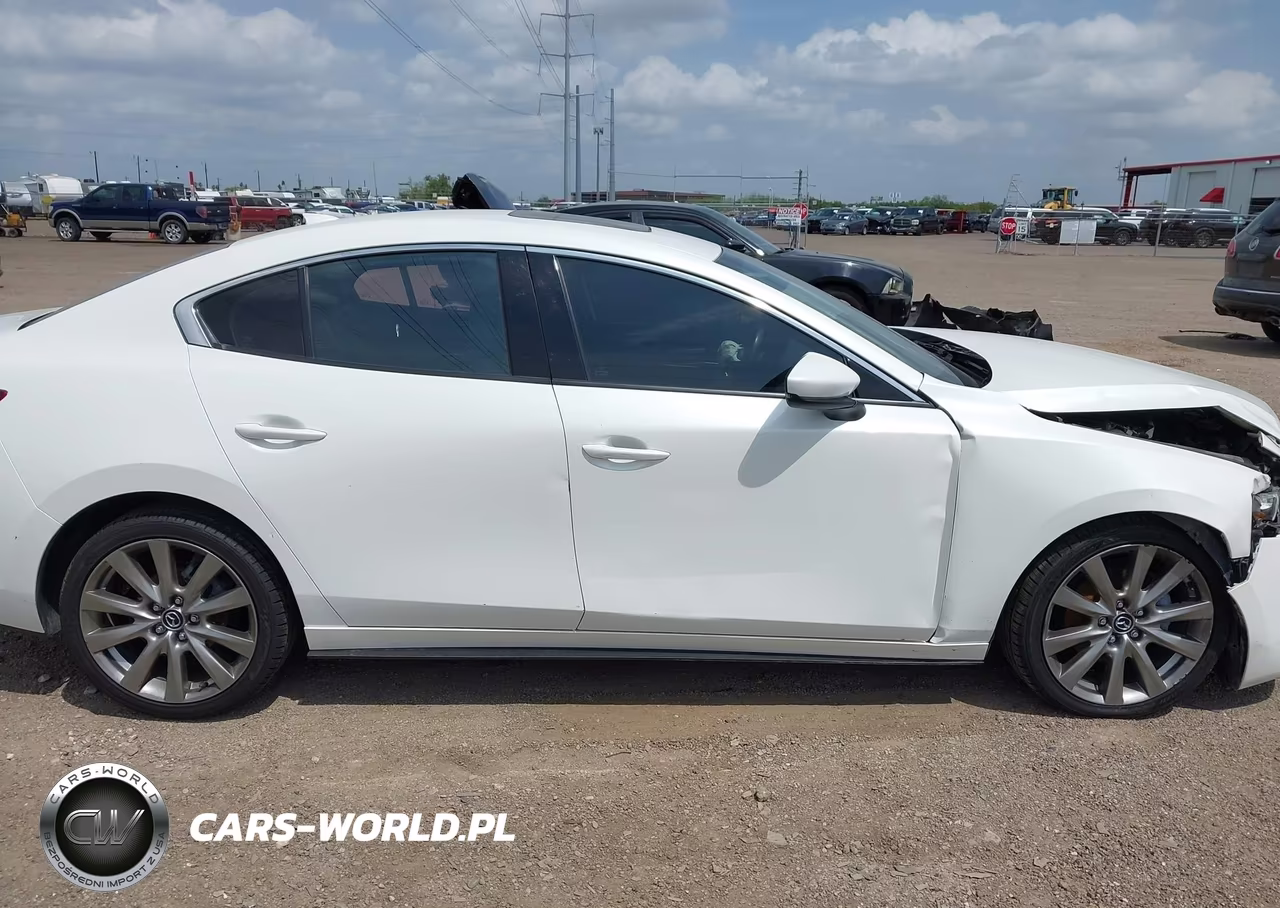 2021 Mazda Mazda3 Premium VIN:3MZBPBDL0MM252688 - 13