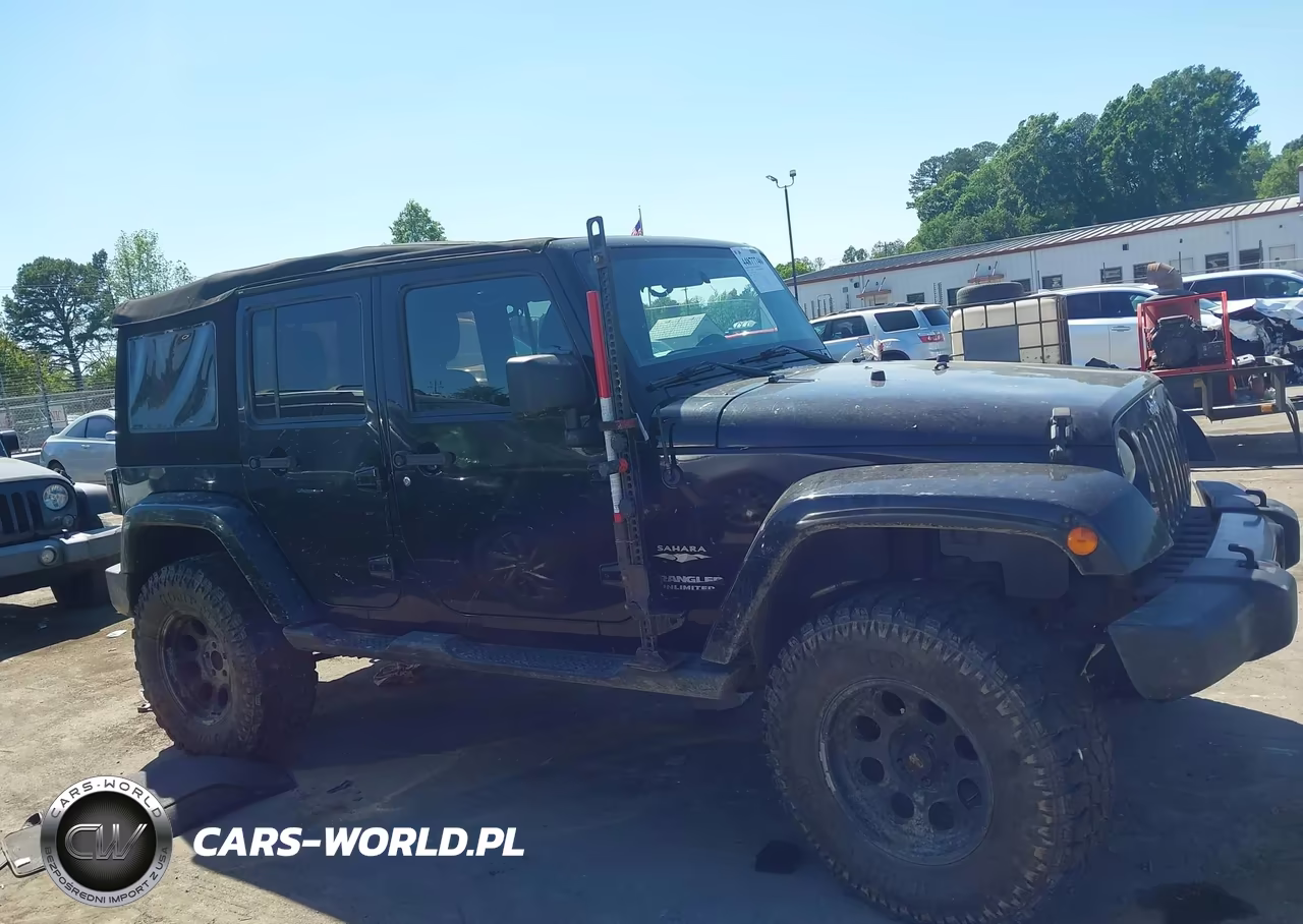 2012 Jeep Wrangler Unlimited Sahara VIN:1C4BJWEG5CL169660 - 13