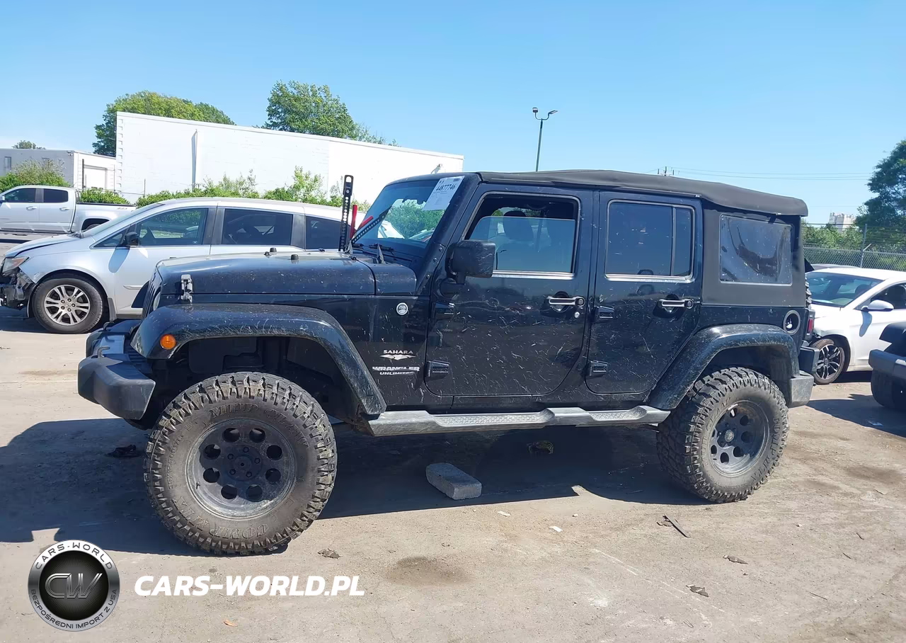 2012 Jeep Wrangler Unlimited Sahara VIN:1C4BJWEG5CL169660 - 14