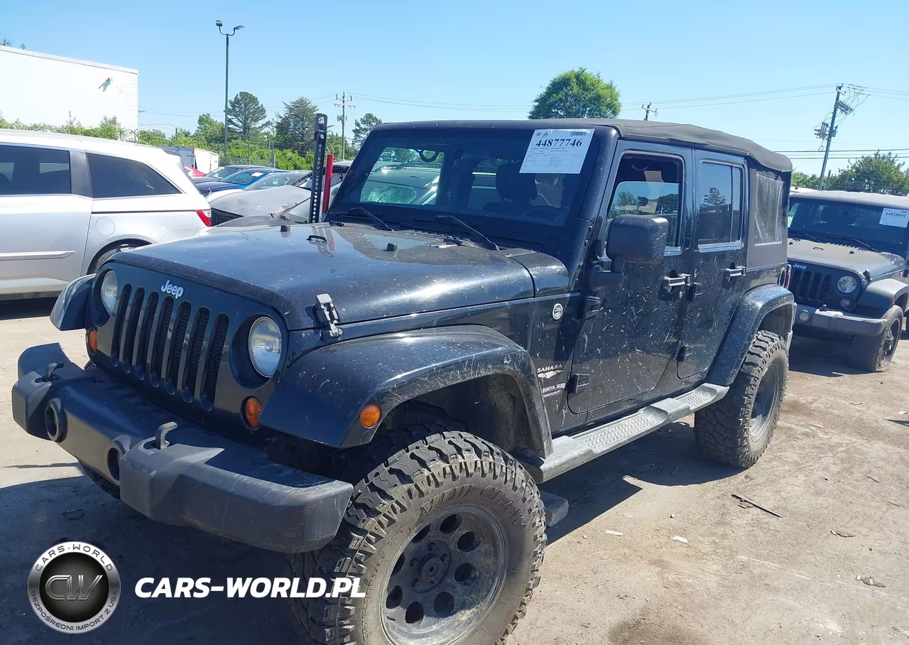 2012 Jeep Wrangler Unlimited Sahara VIN:1C4BJWEG5CL169660 - 2