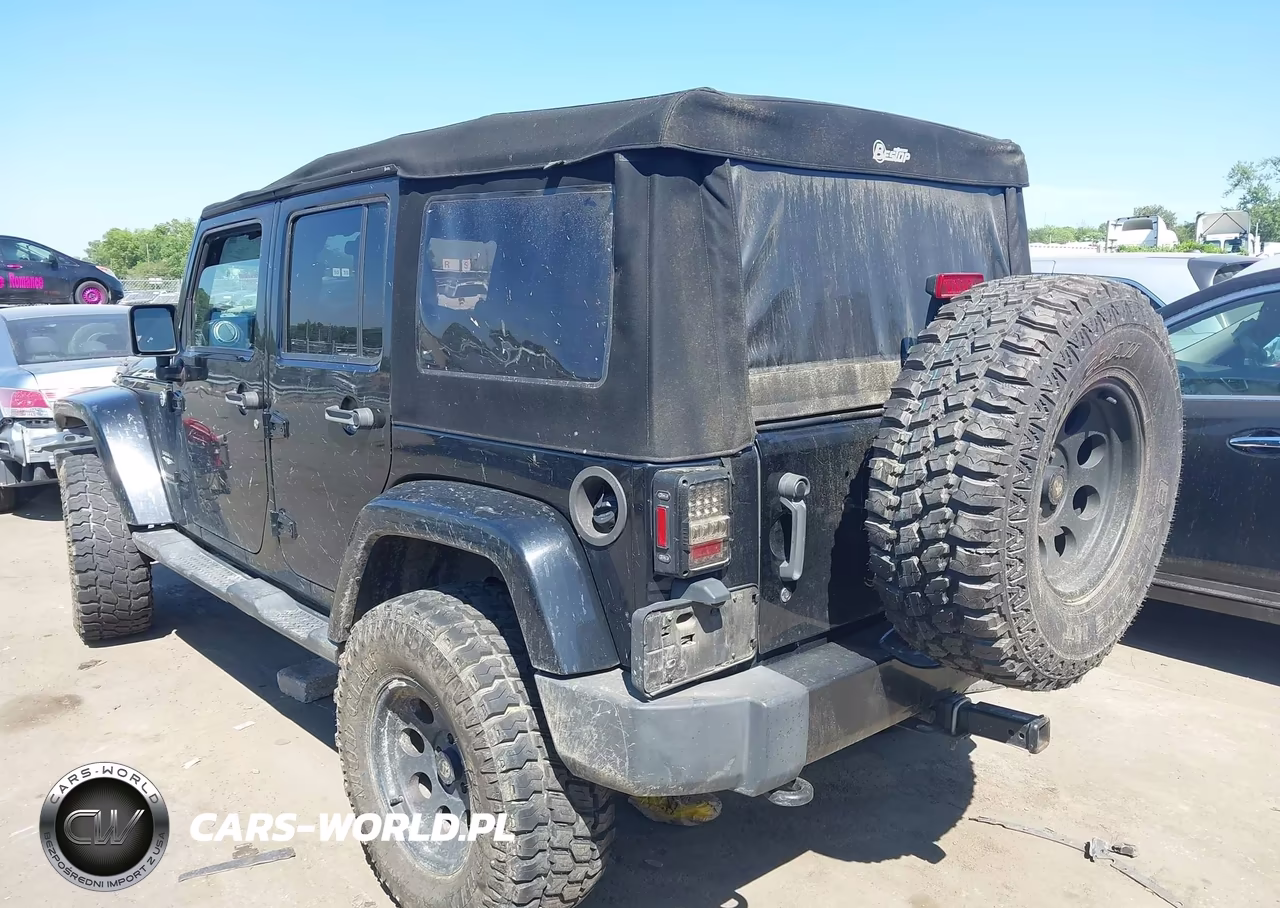 2012 Jeep Wrangler Unlimited Sahara VIN:1C4BJWEG5CL169660 - 3