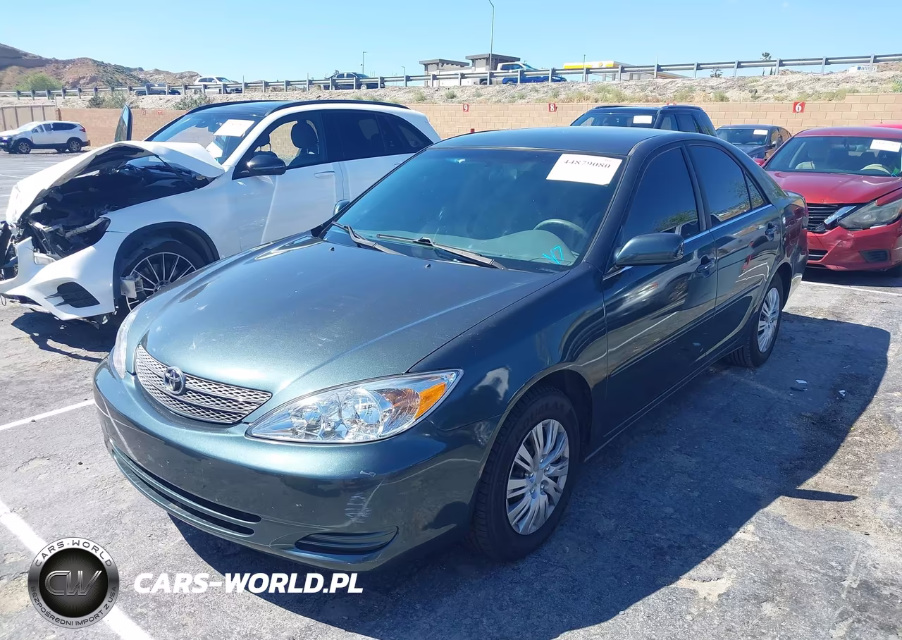 2002 Toyota Camry Le VIN:JTDBE32K420137987 - 2