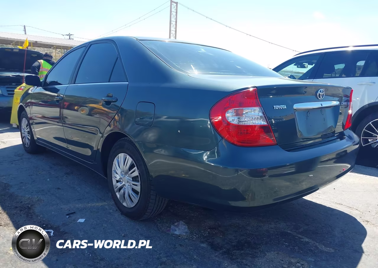 2002 Toyota Camry Le VIN:JTDBE32K420137987 - 3