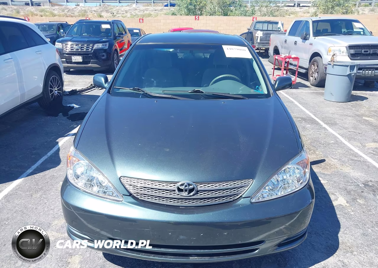 2002 Toyota Camry Le VIN:JTDBE32K420137987 - 6