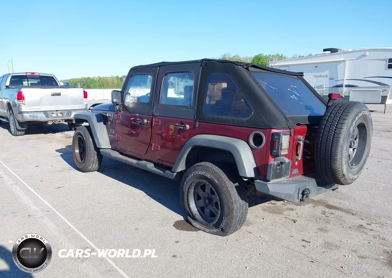 2009 Jeep Wrangler Unlimited X VIN:1J4GA39149L783208 - 3