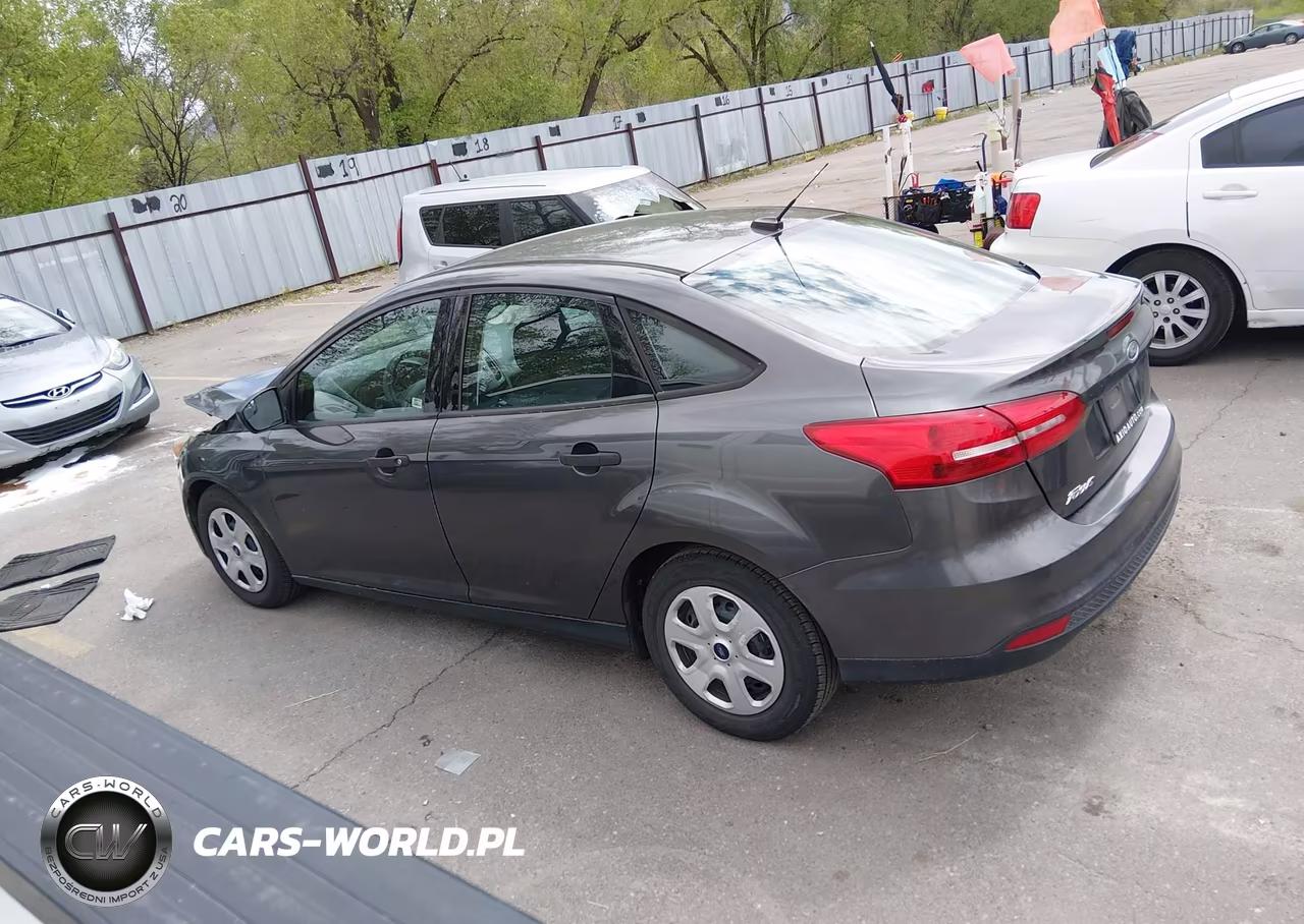 2018 Ford Focus S VIN:1FADP3E23JL322615 - 14