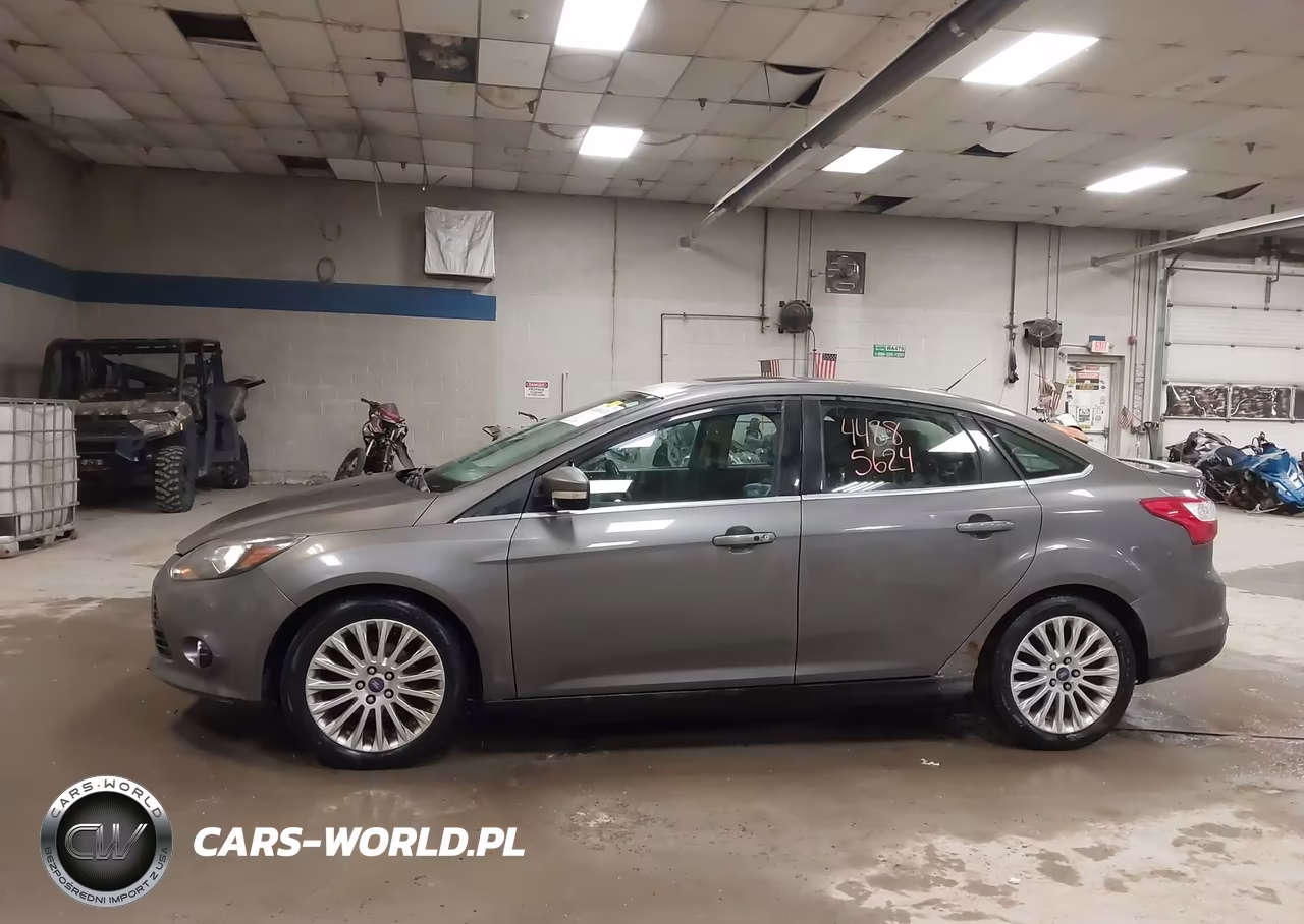 2012 Ford Focus Titanium VIN:1FAHP3J21CL292265 - 14