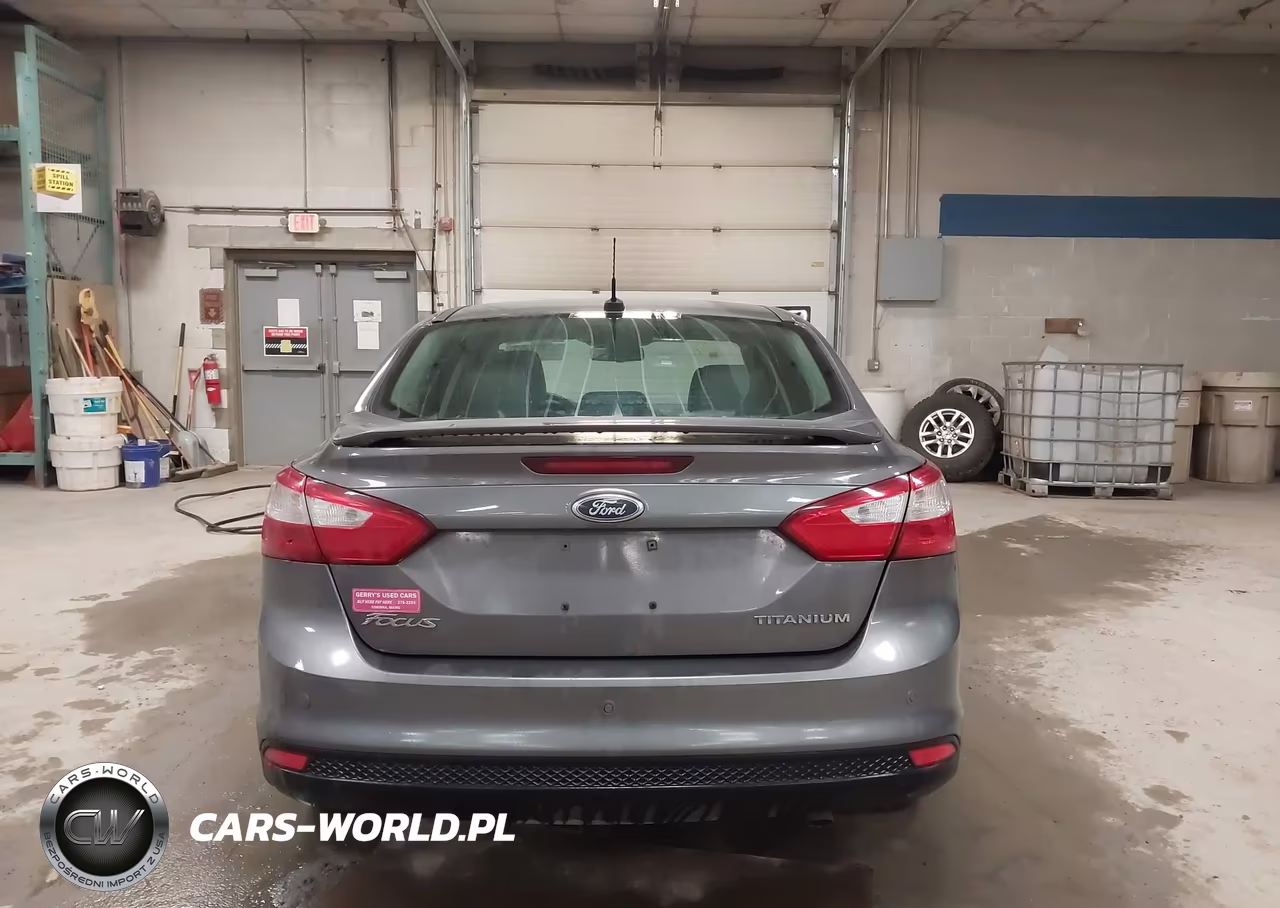 2012 Ford Focus Titanium VIN:1FAHP3J21CL292265 - 16