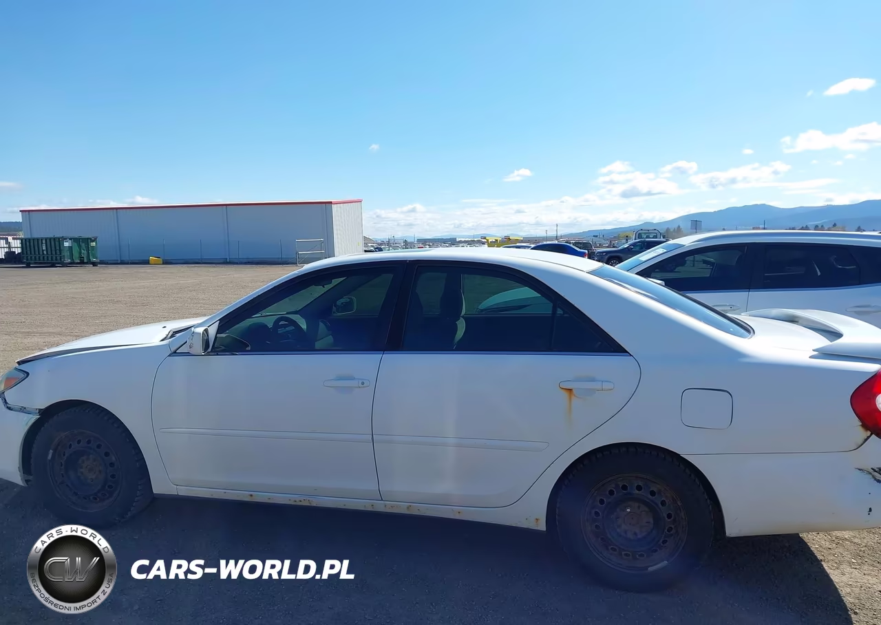 2002 Toyota Camry Le VIN:JTDBE30K120025487 - 14